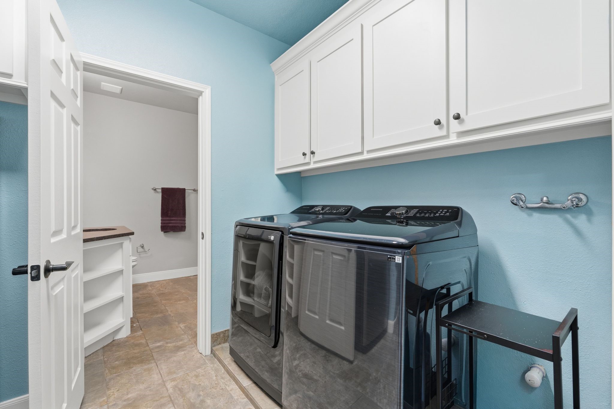 Laundry Room w/Cabinets & Room for Refrigerator or Popcorn Maker.
