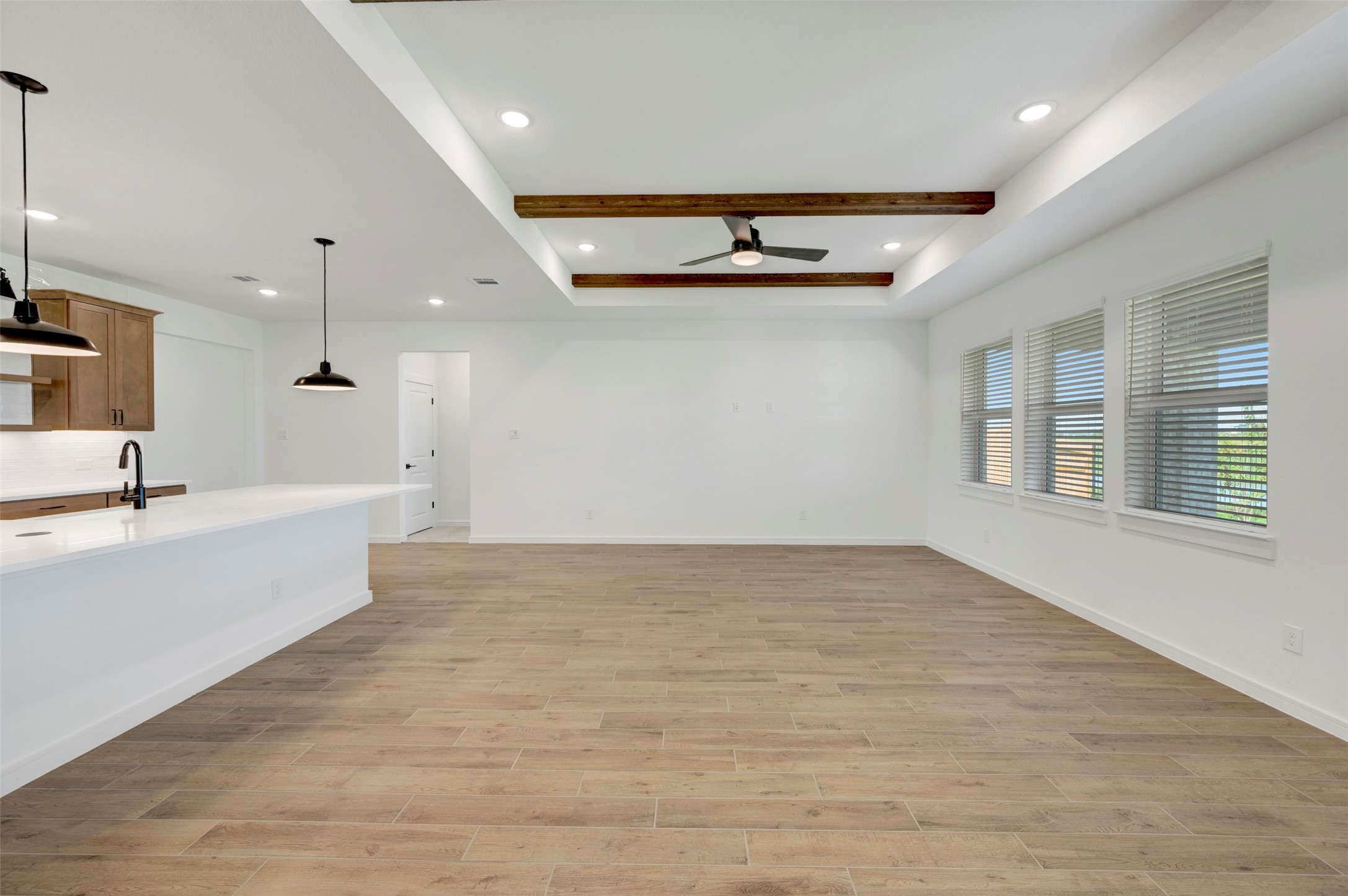 Great room with ceiling beams Great room with ceiling beams