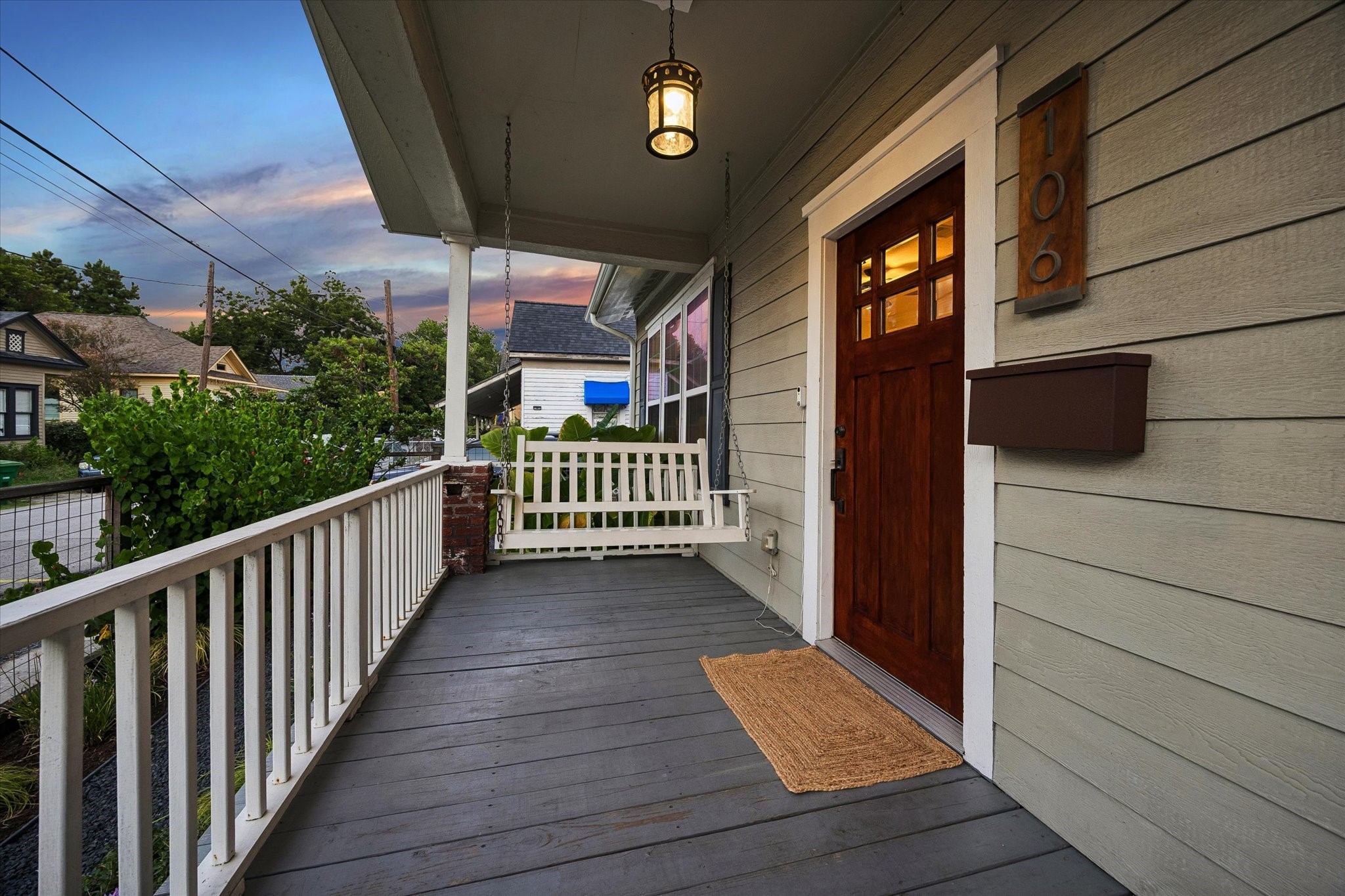 Sit on your porch swing to enjoy the sights and sounds of the Heights