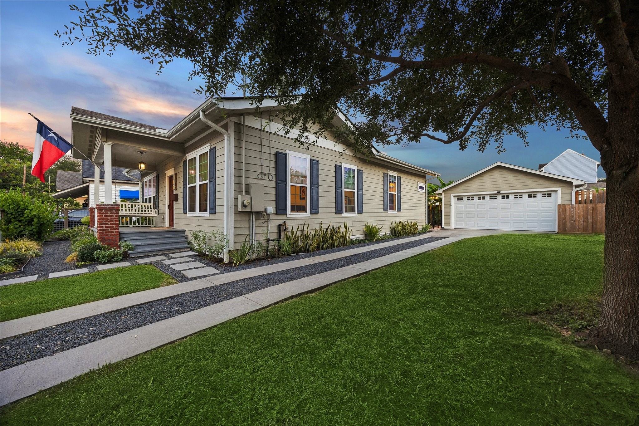 2 car garage with a spacious side yard
