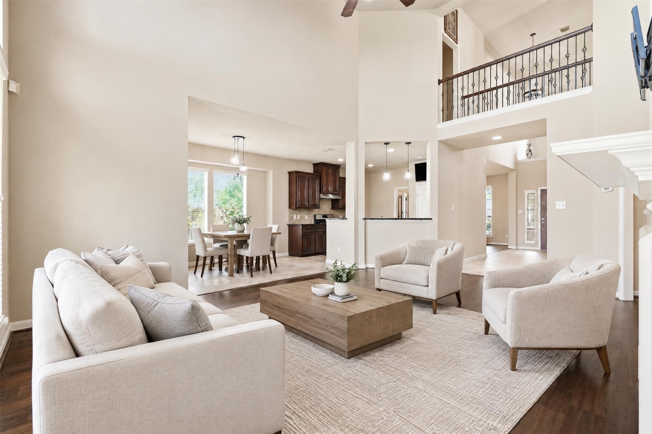 Virtually staged. Soaring ceilings and an upstairs overlook give the home an open, airy feel you notice the moment you walk in.