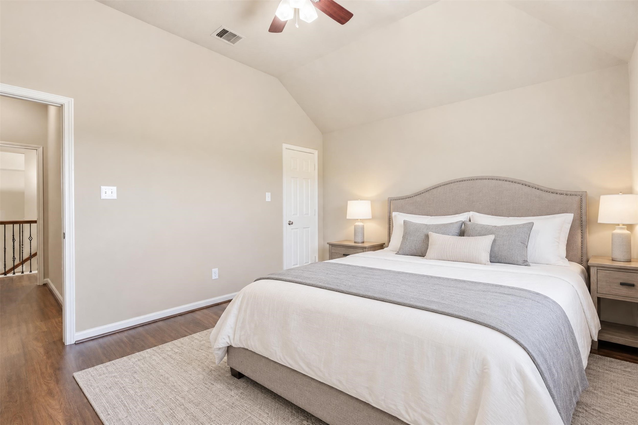 Virtually staged. Another angle of the second bedroom showing its open floor space and closet.