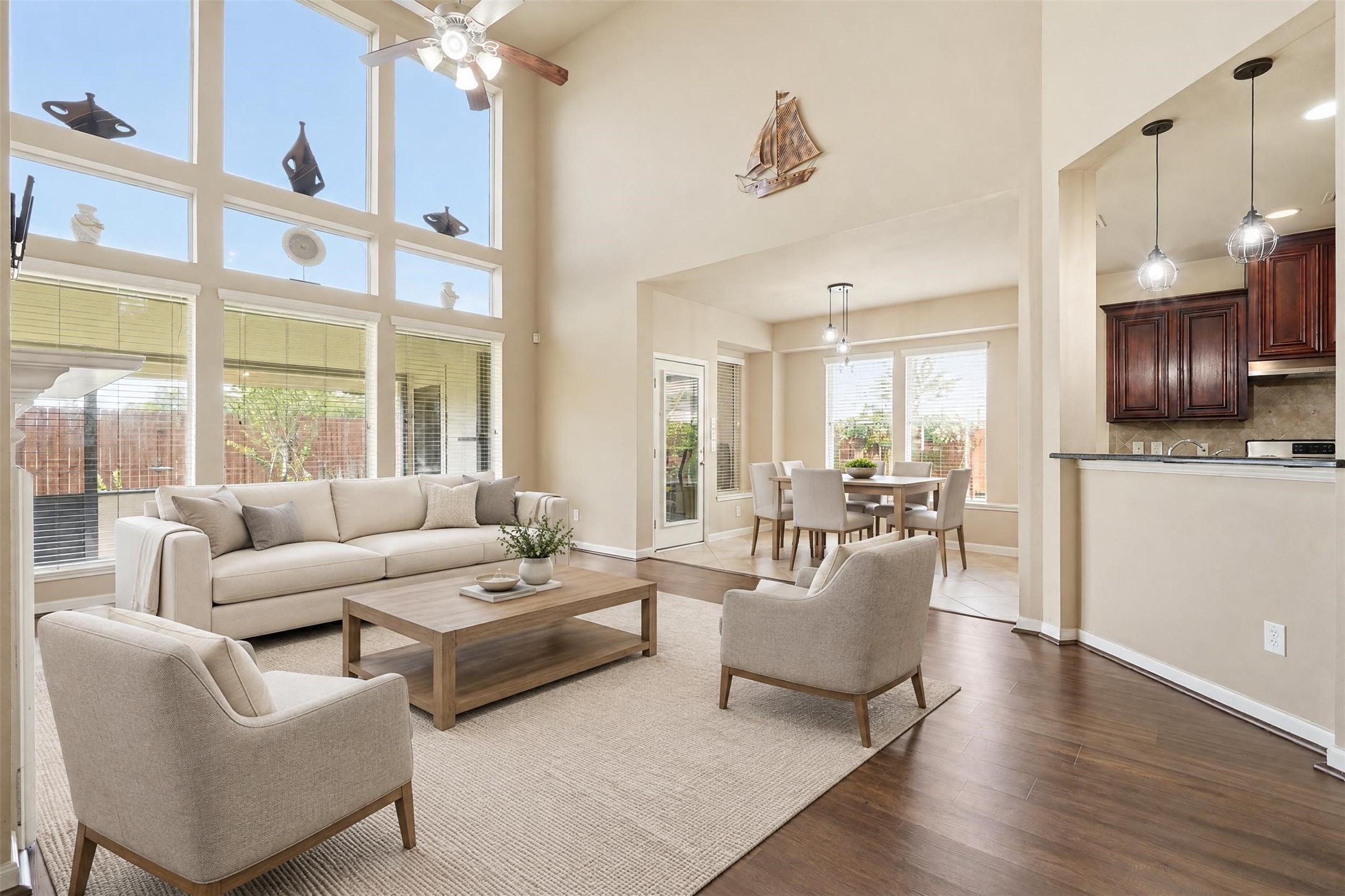 Virtually staged. An open layout connects the living room, breakfast area and kitchen, so conversation and movie nights flow easily from one space to the next.