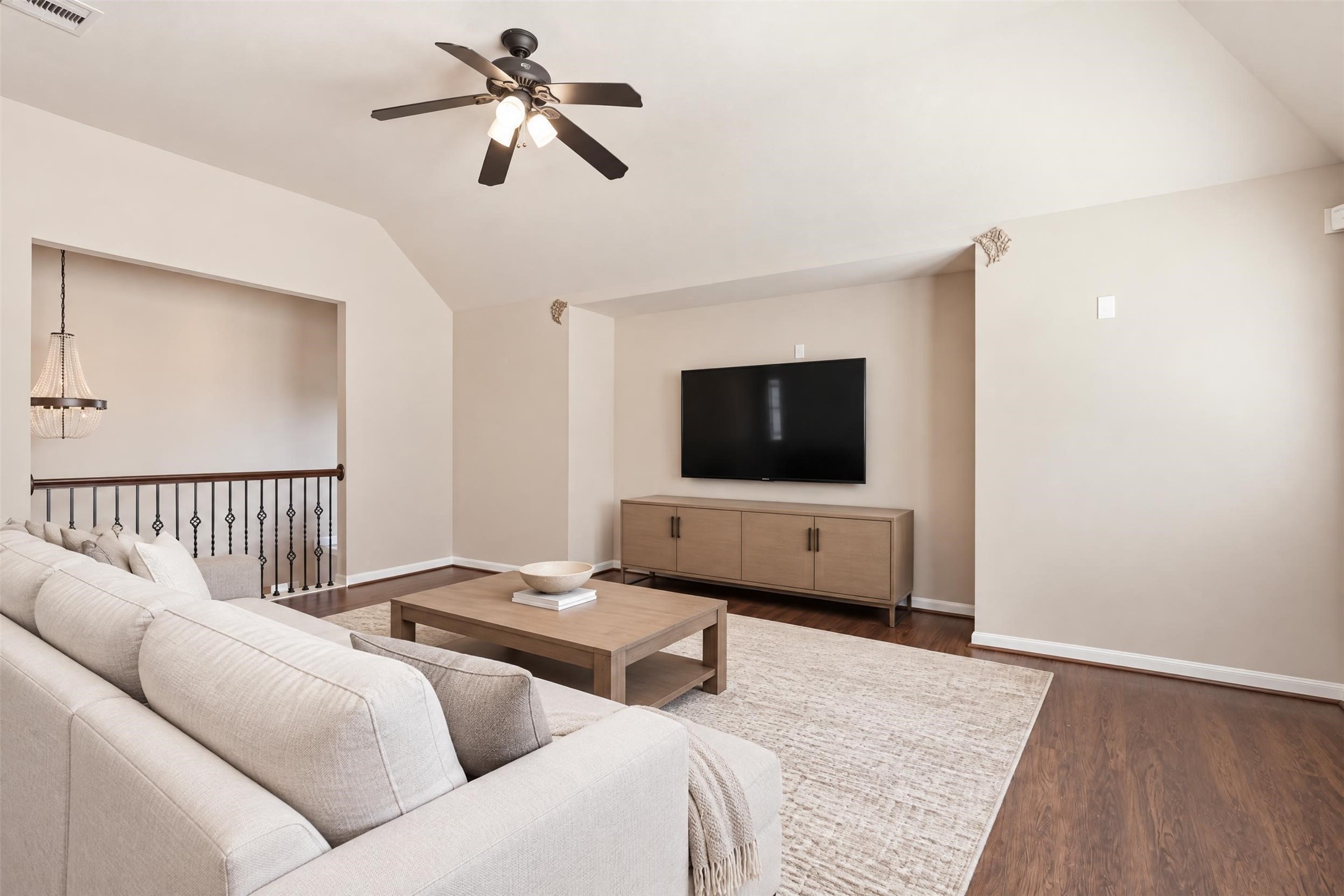 Virtually staged. Upstairs, the roughly 19'3" x 14'6" game room overlooks the entry and gives everyone a second living space for movies, games or a home gym.