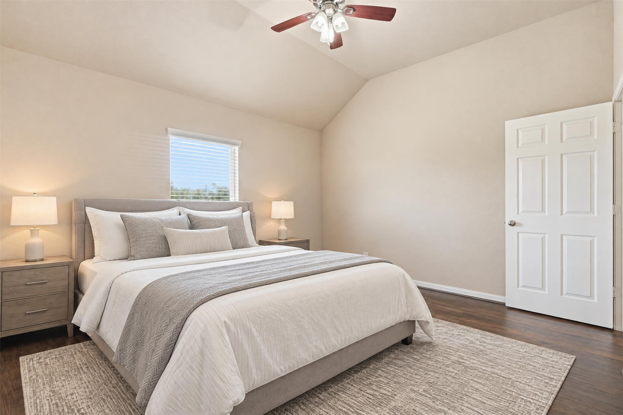 Virtually staged. Bright, comfortable and quiet, this bedroom works well for guests, family members or a home office.