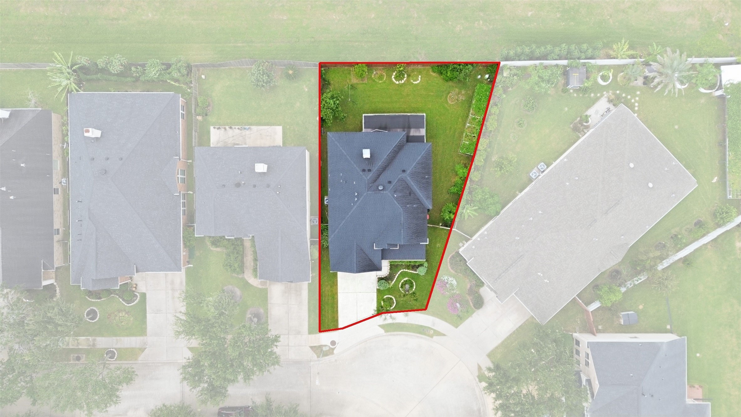 The highlighted lot shows the full footprint: a pie-shaped cul-de-sac lot that widens in back for a bigger yard, backing to open green space.