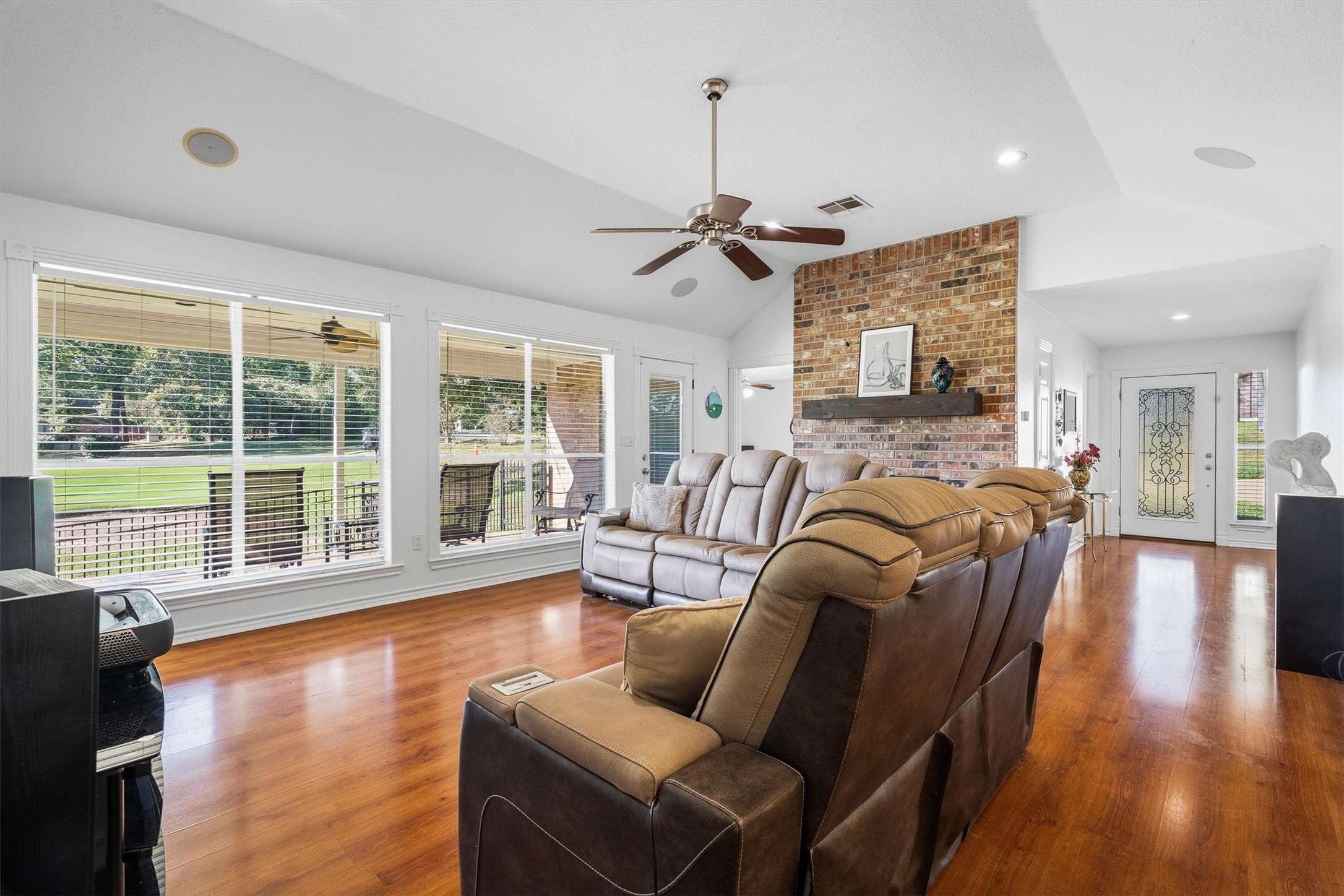 The living room is wired for sound with in-ceiling speakers, so movie nights and game days come with real surround sound.