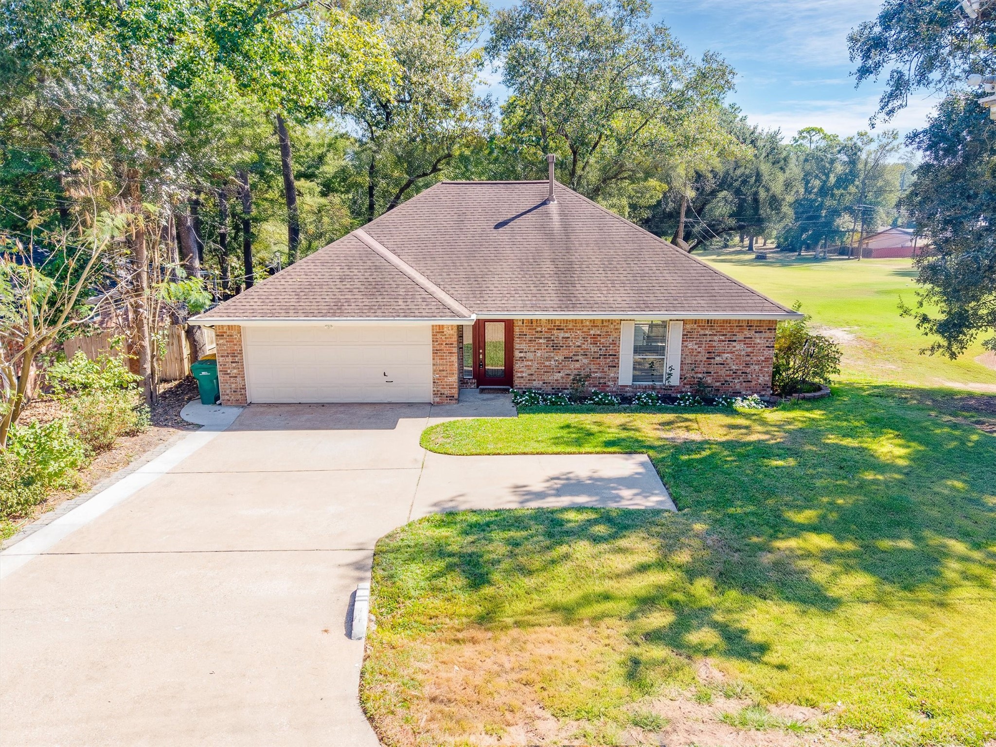 Welcome to 149 Thunderbird Drive, Conroe, TX 77304, a brick single-story home in Panorama Village that sits right alongside the golf course. Shade trees on one side, open fairway on the other, and thats just the front yard. Welcome to 149 Thunderbird Drive, Conroe, TX 77304, a brick single-story home in Panorama Village that sits right alongside the golf course. Shade trees on one side, open fairway on the other, and thats just the front yard.