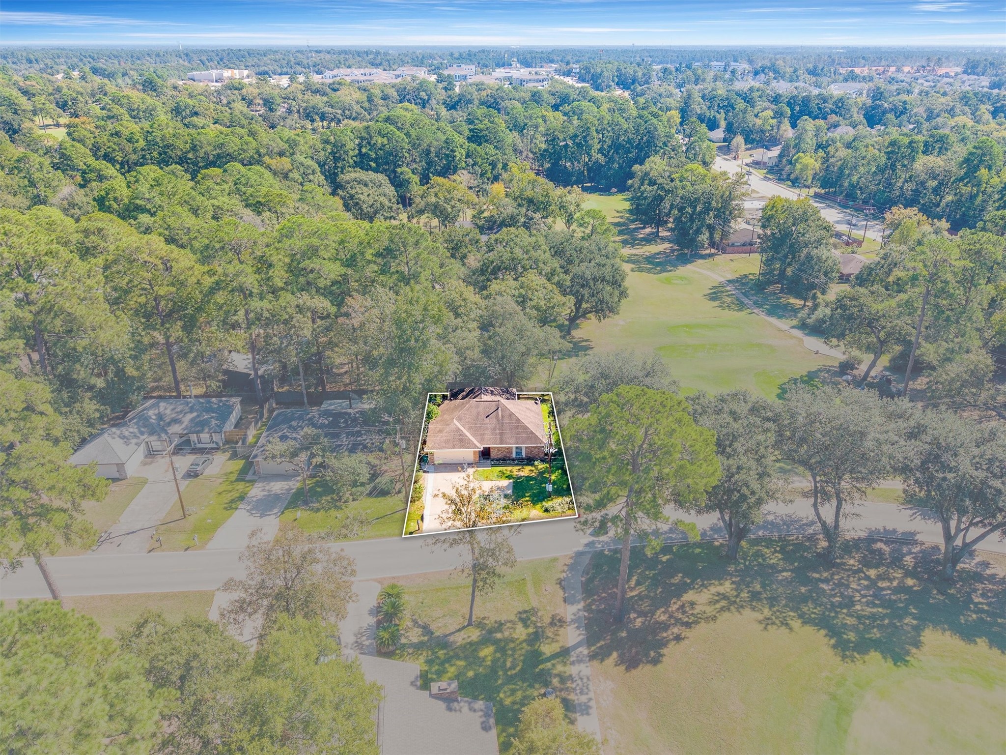 Beyond the treetops, quick access to I-45 by way of League Line Rd puts Conroe, The Woodlands, and Lake Conroe within easy reach.
