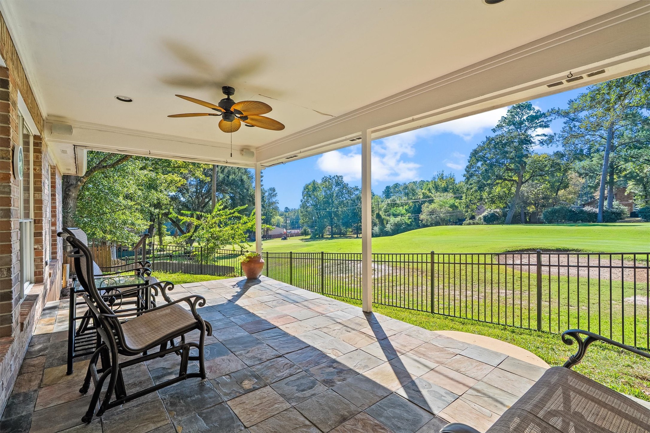 THIS is the reason youll want to live at 149 Thunderbird. Panorama Village is built around one golf course, and this home claims a covered patio facing the 16th tee box, a ceiling fan overhead, and a fairway view that never needs a tee time.