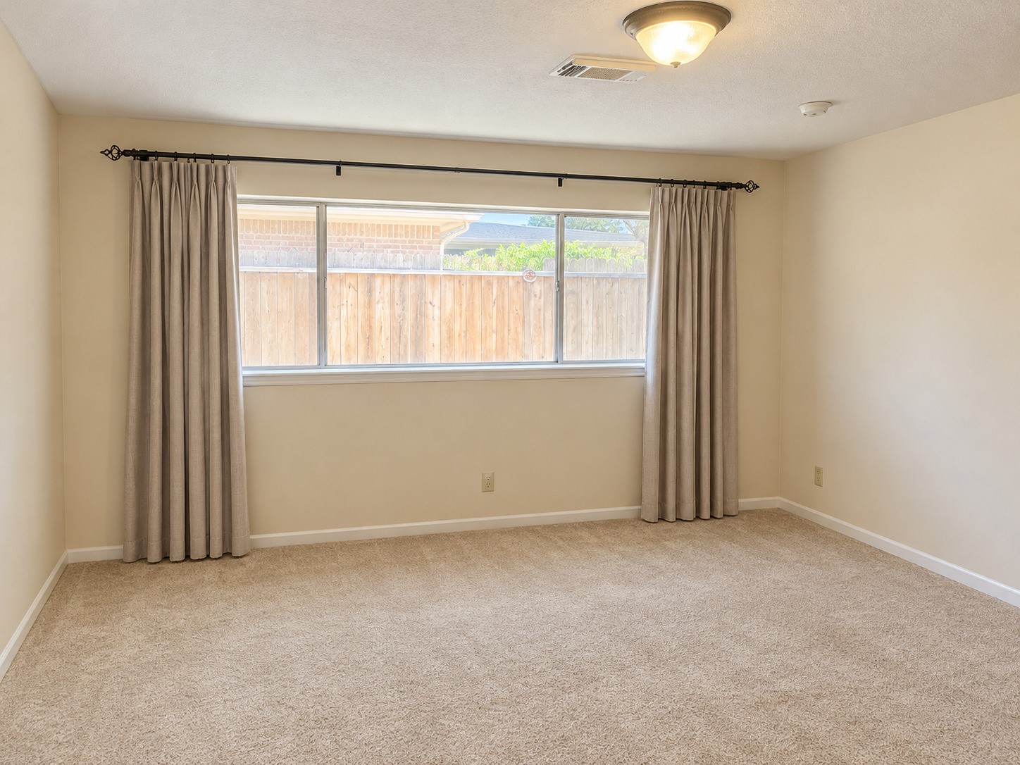 Digitally enhanced to remove furniture. Primary bedroom with ensuite.