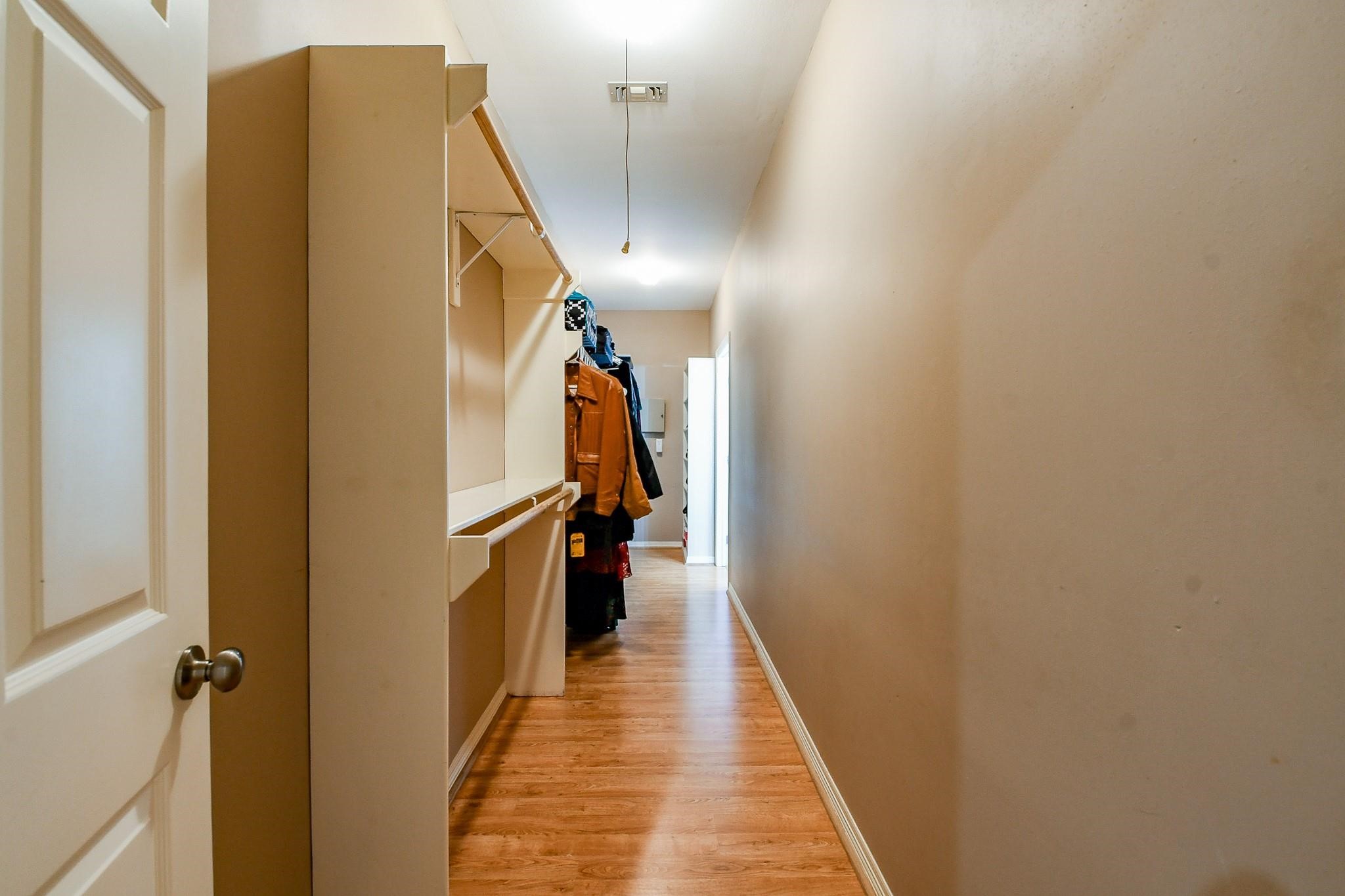 Massive walk-in closet in the primary house