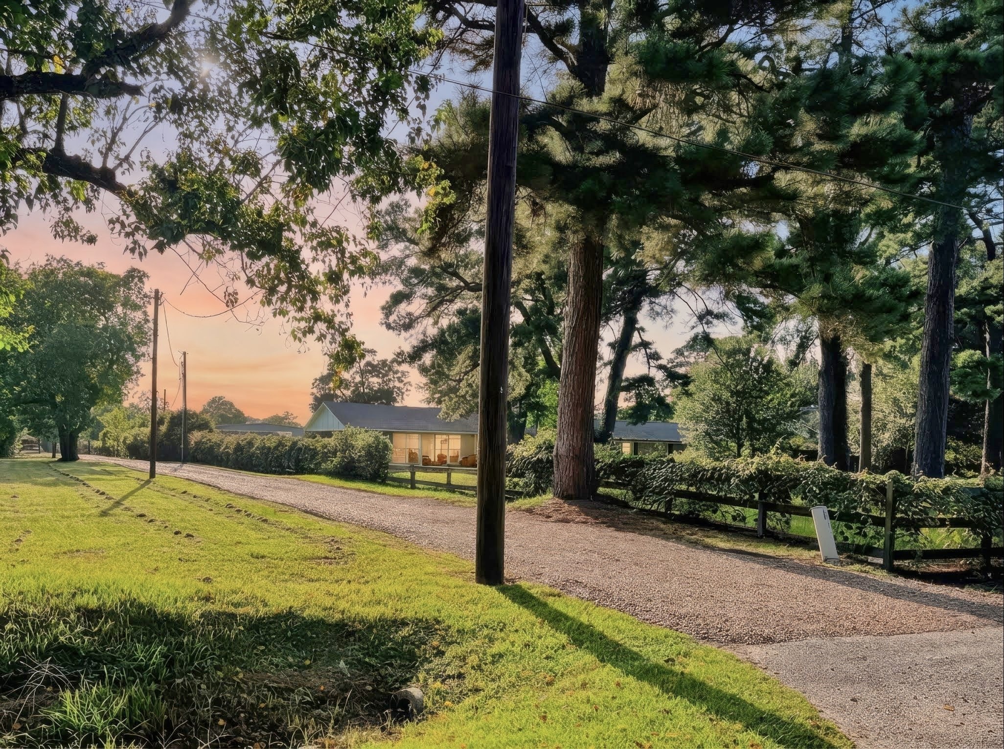 View from the street going up the private driveway