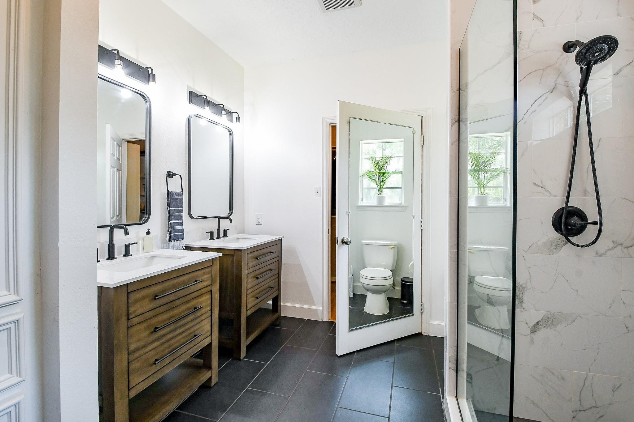 Recently remodeled primary bath in the primary house