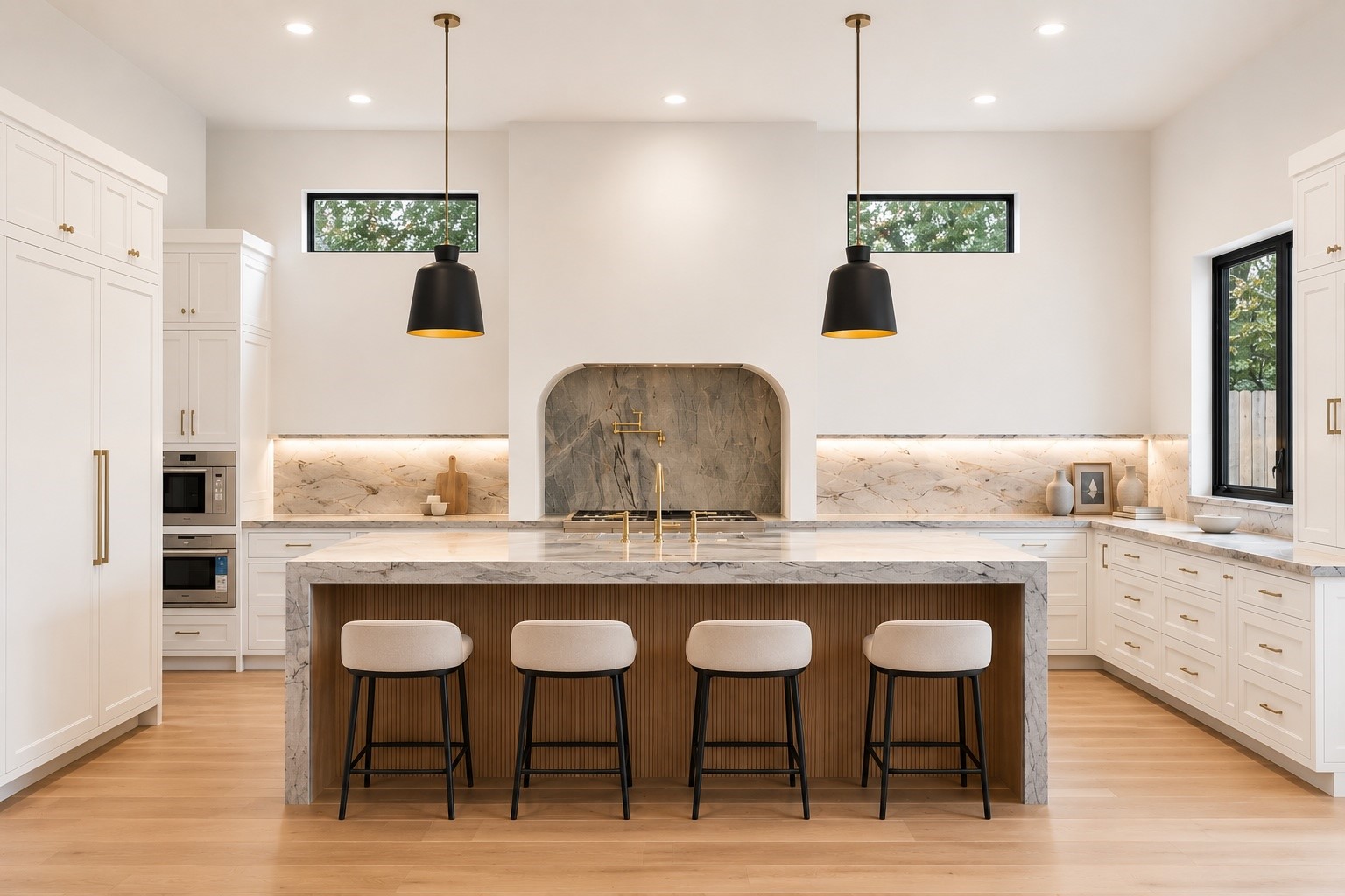 Designed to impress, the kitchen pairs a dramatic waterfall island with fully inset, floor to ceiling cabinetry and a statement vent surround. High end natural stone throughout the home - quartzite, cristallo quartzite, limestone, onyx, marble, and soapstone - sets the tone here, where an upgraded Thermador package with a panel ready fridge/freezer combo elevates everyday function, alongside a seamless connection to the scullery. **Virtually staged** Designed to impress, the kitchen pairs a dramatic waterfall island with fully inset, floor to ceiling cabinetry and a statement vent surround. High end natural stone throughout the home - quartzite, cristallo quartzite, limestone, onyx, marble, and soapstone - sets the tone here, where an upgraded Thermador package with a panel ready fridge/freezer combo elevates everyday function, alongside a seamless connection to the scullery. **Virtually staged**