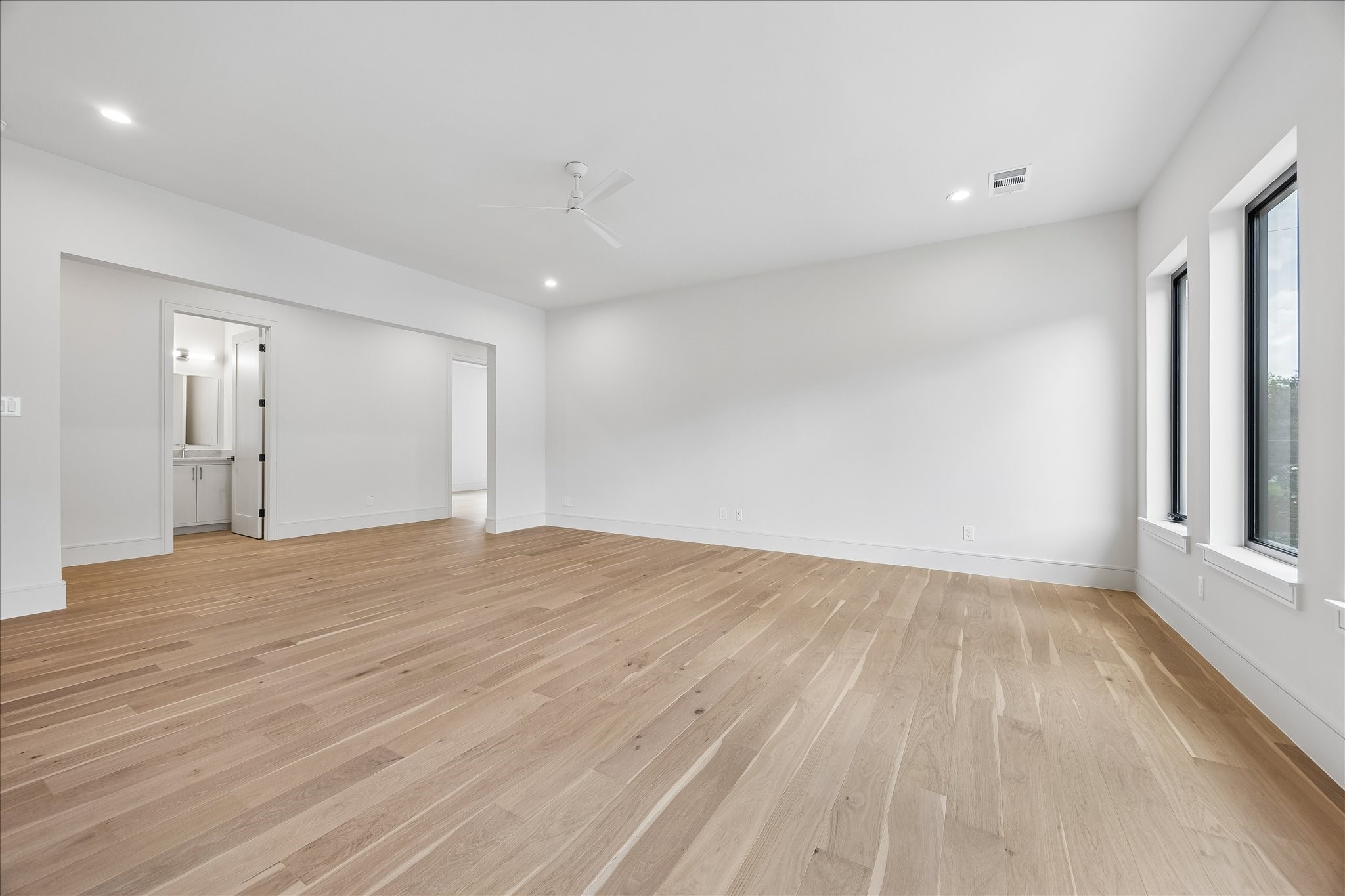 Open sightlines and an expansive layout offer endless flexibility for a media room, game space, or second living area. A dedicated half bath just steps away makes this the ideal gathering space for family and guests among the homes four upstairs bedrooms.