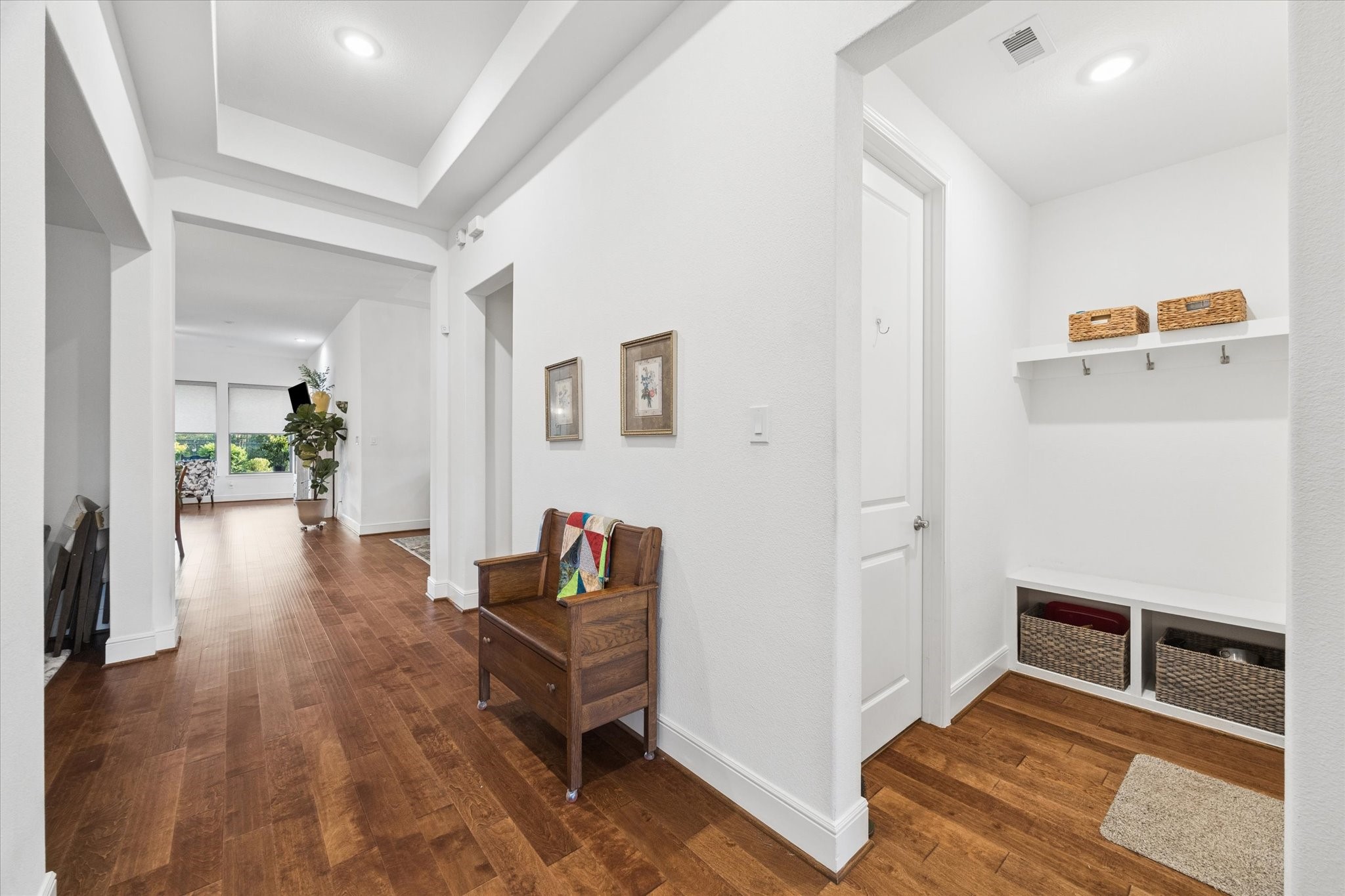 Entryway with the study on the left and the mud room on the right