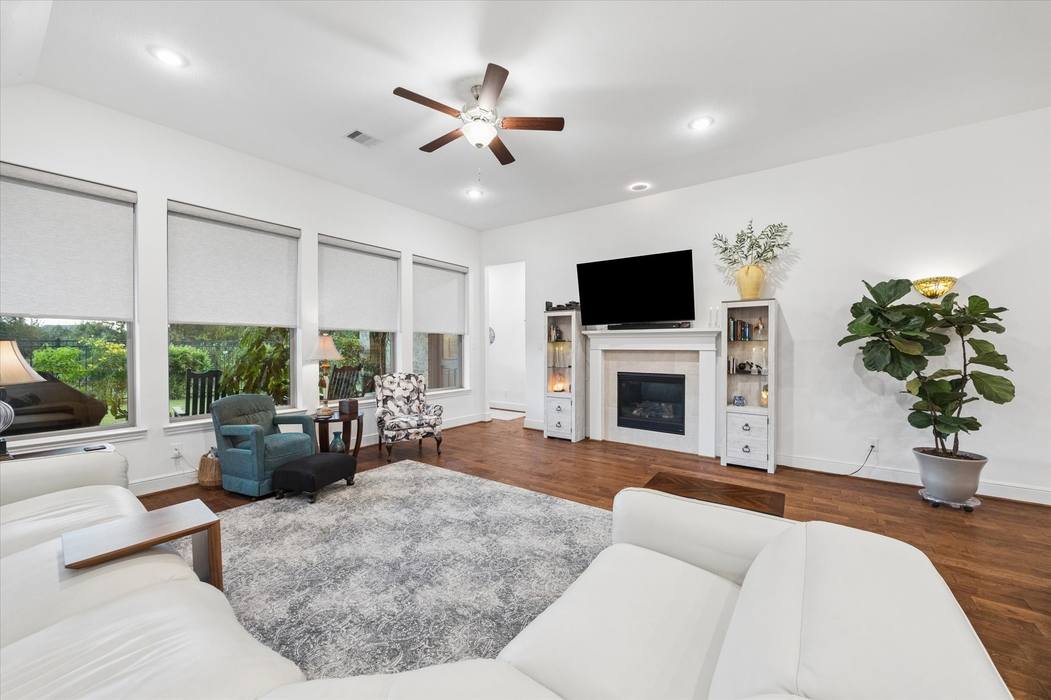 Another view of the living room and fireplace