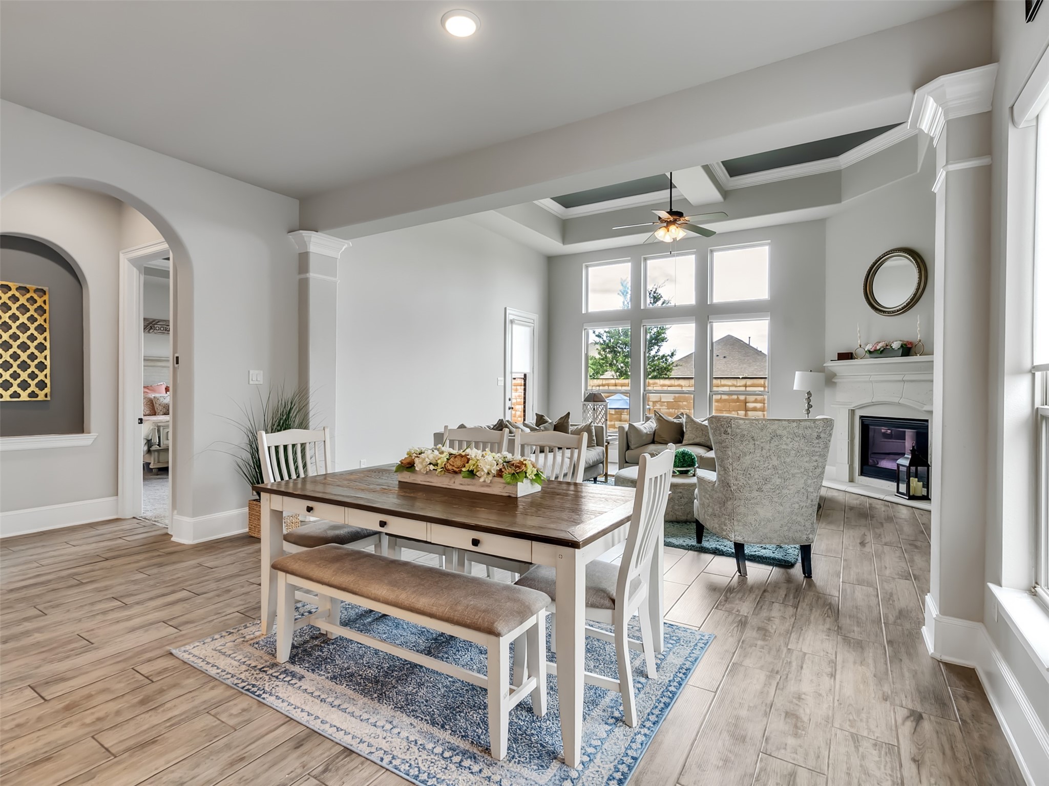 Casual dining area opens into spacious family room.