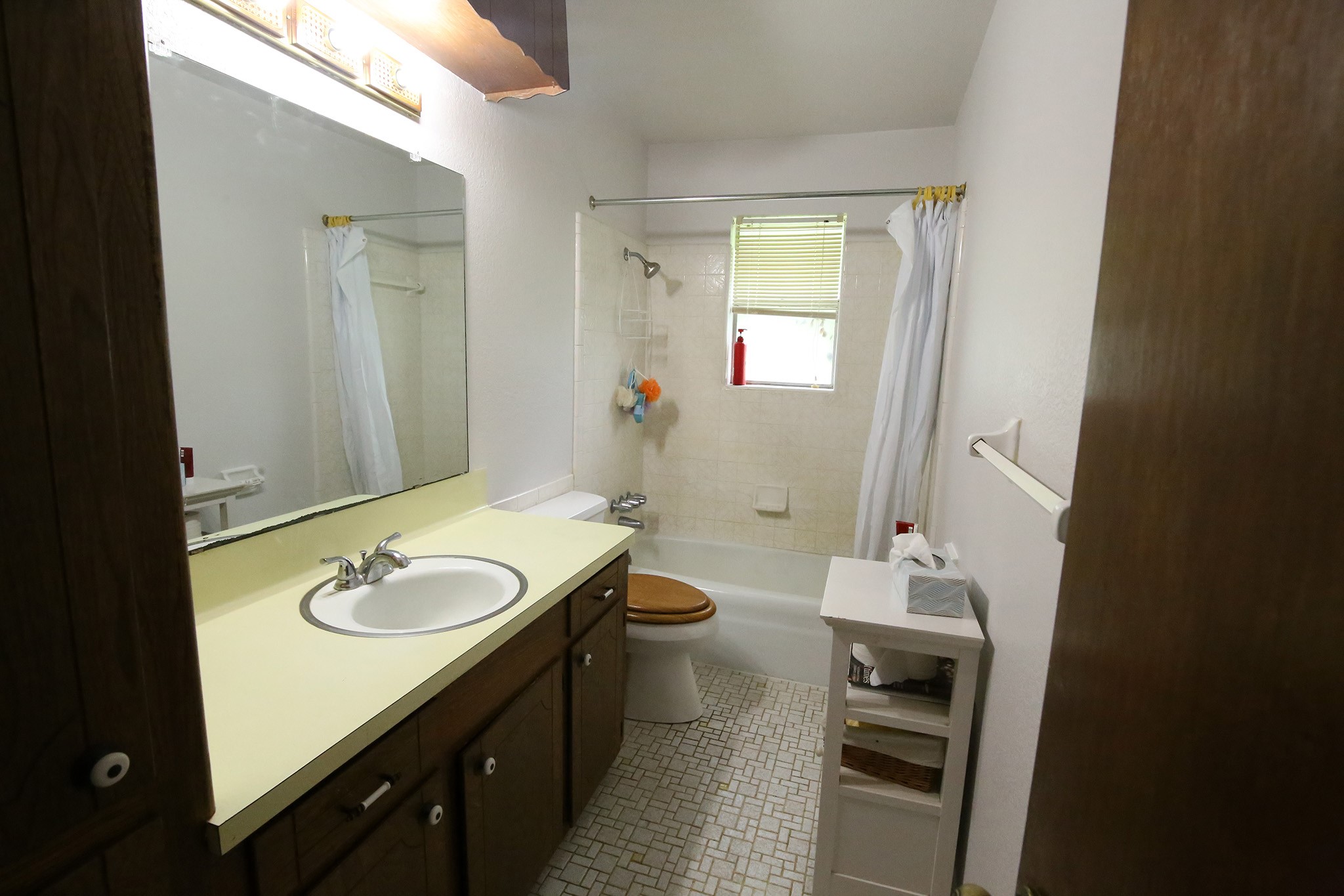 Comfortable bath with versatile shower/tub combo.