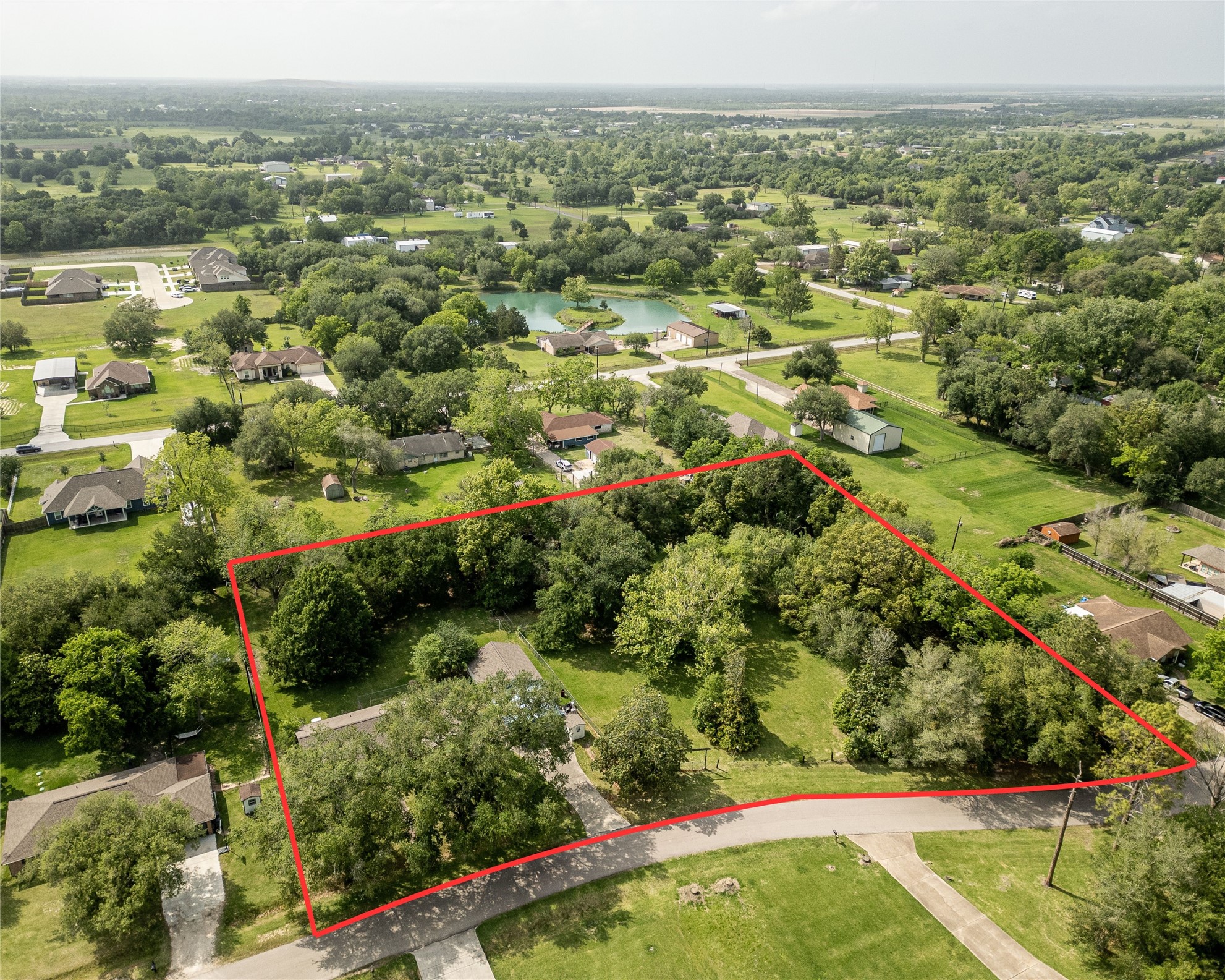 Drone Shot of the whole 1.8 Acres with the House, Garage, Barn, Chicken Coop and Greenhouse!
