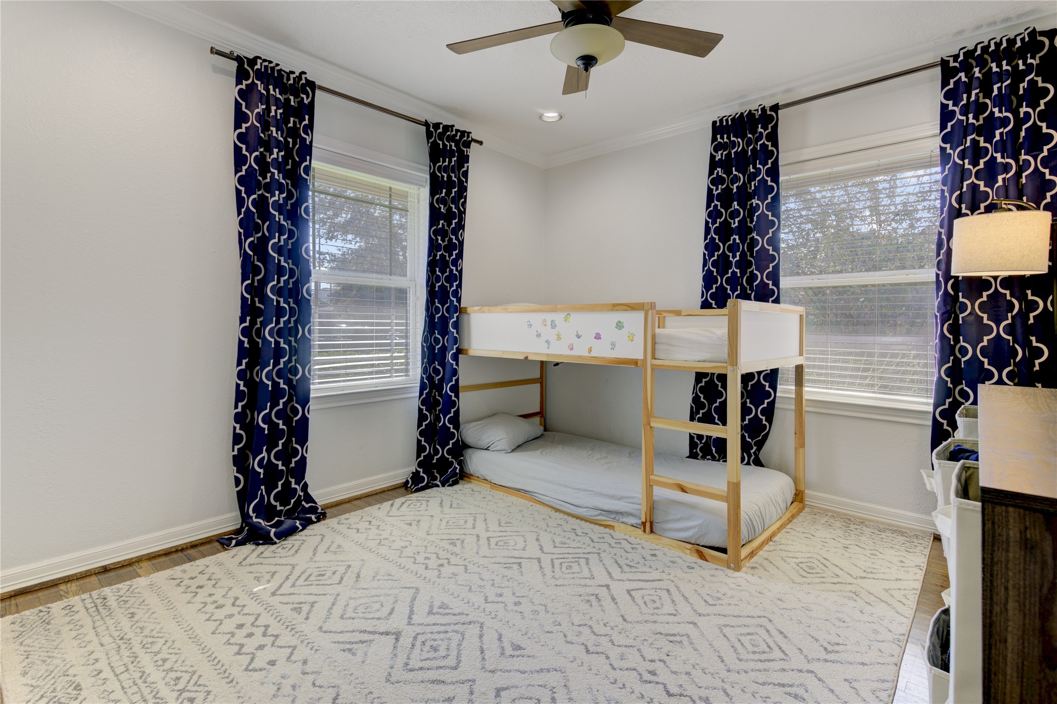 One of two secondary bedrooms, also with a custom closet storage system.