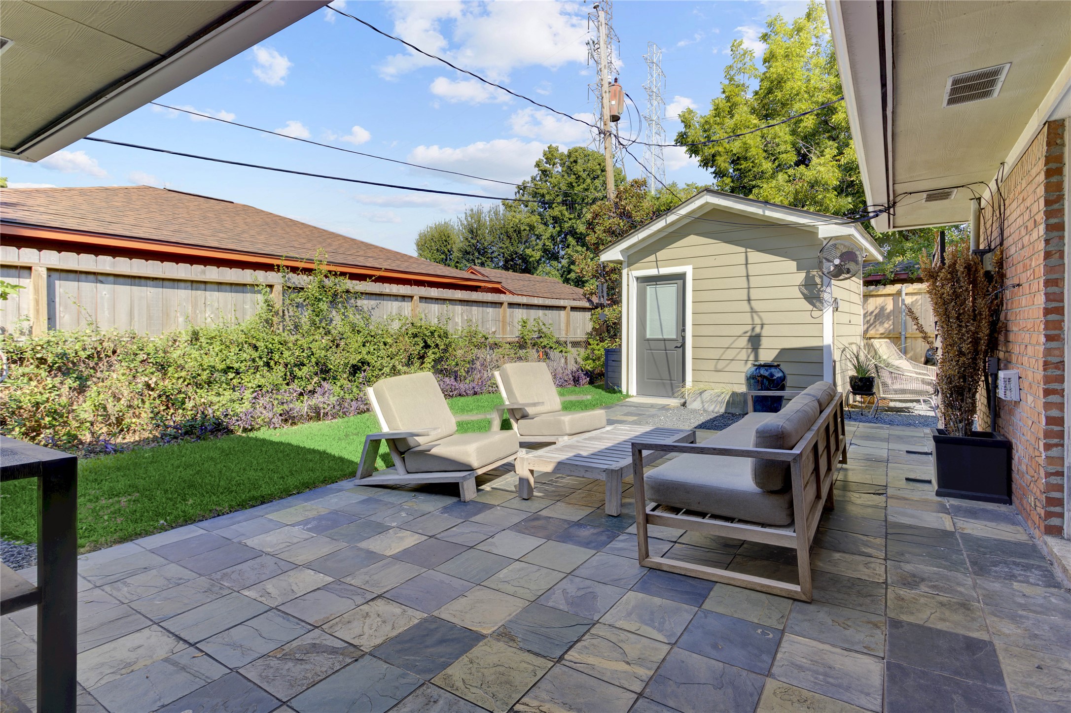 Through the sliding glass door, relax or entertain on the slate patio while grilling or watching the big game.