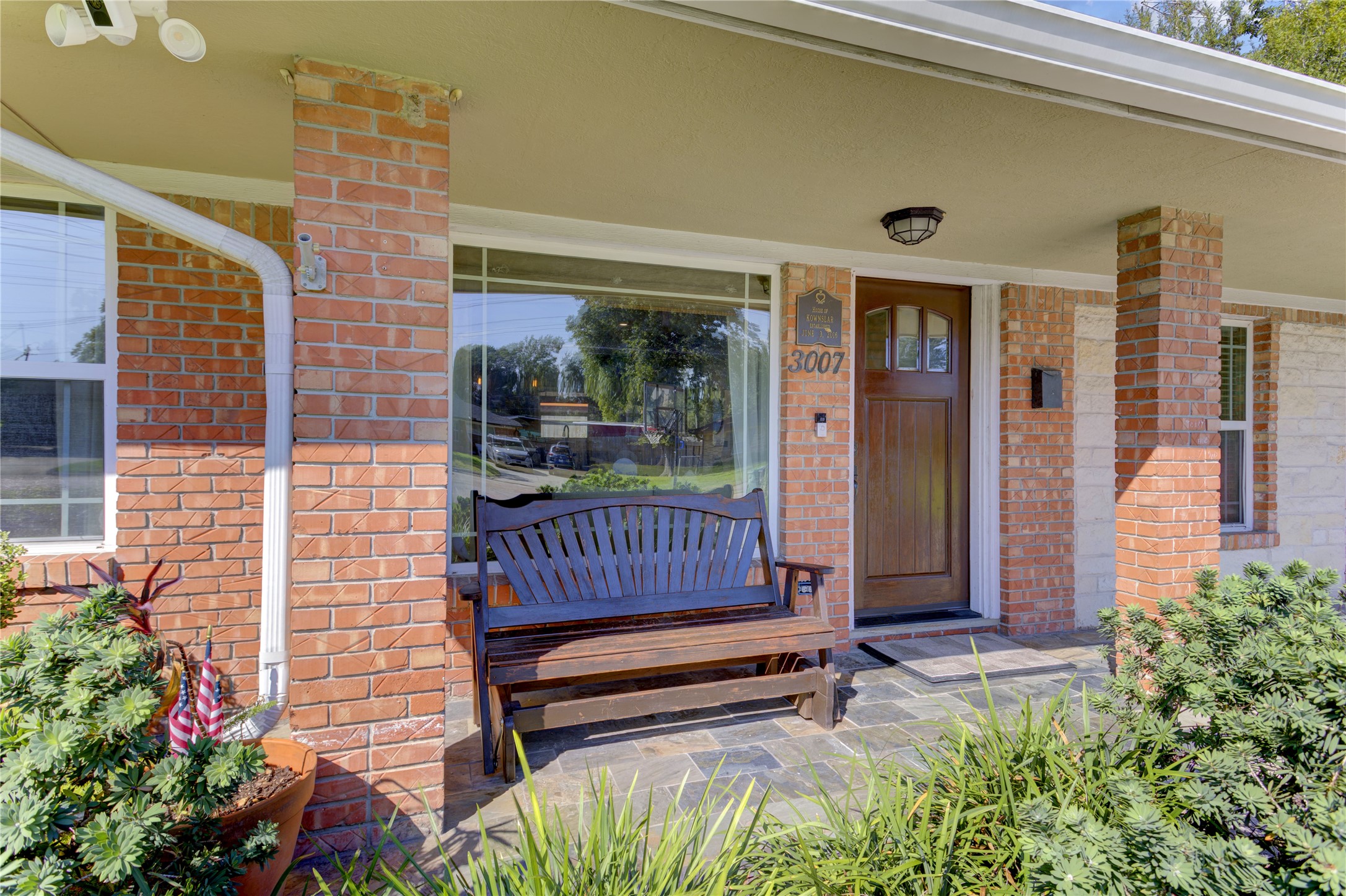 Inviting front porch as you enter the home, perfect for enjoying the sunrise or watching the happenings in the cul-de-sac.
