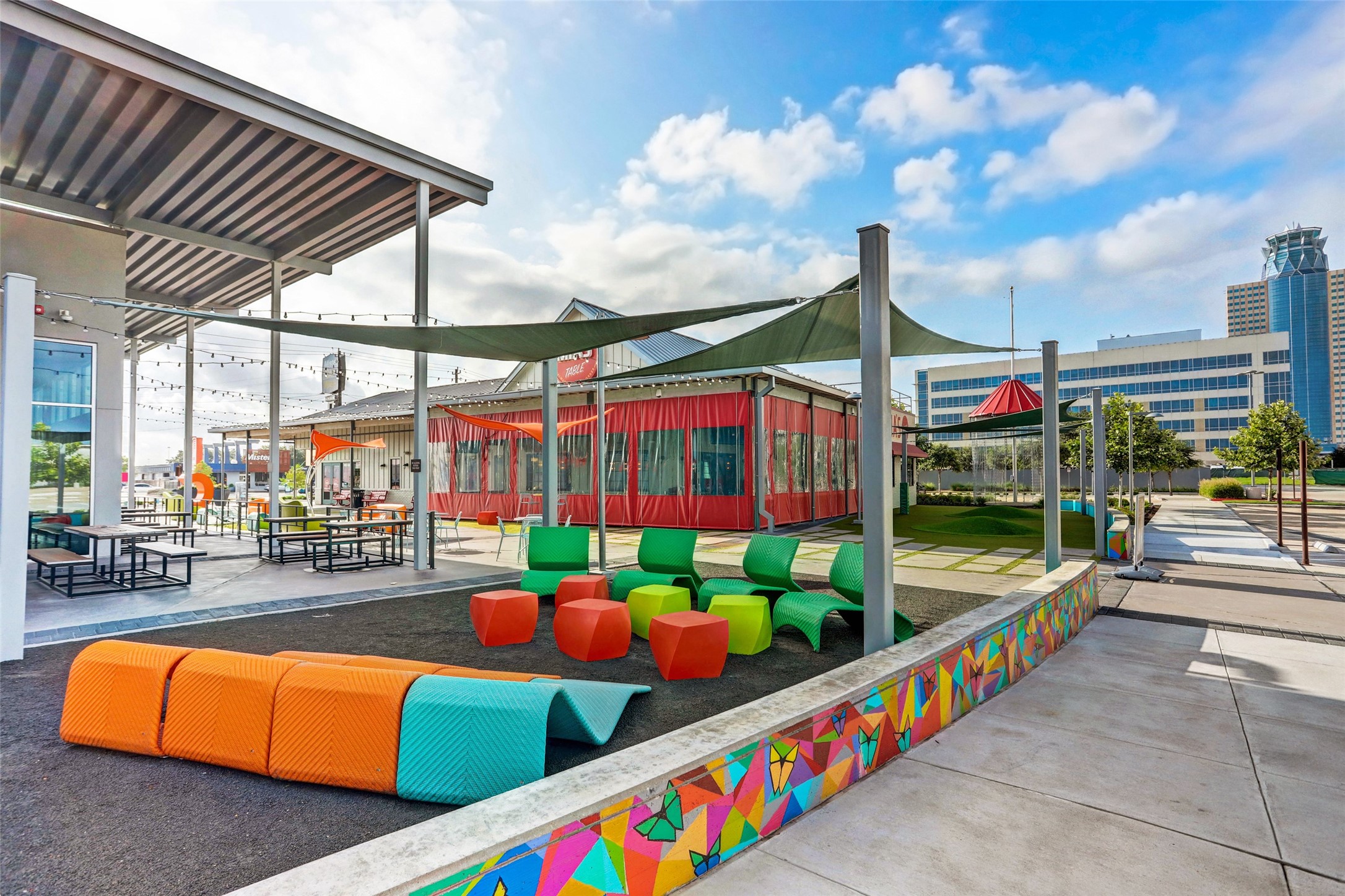 Torchy's offers covered outdoor seating options as well as a play area.