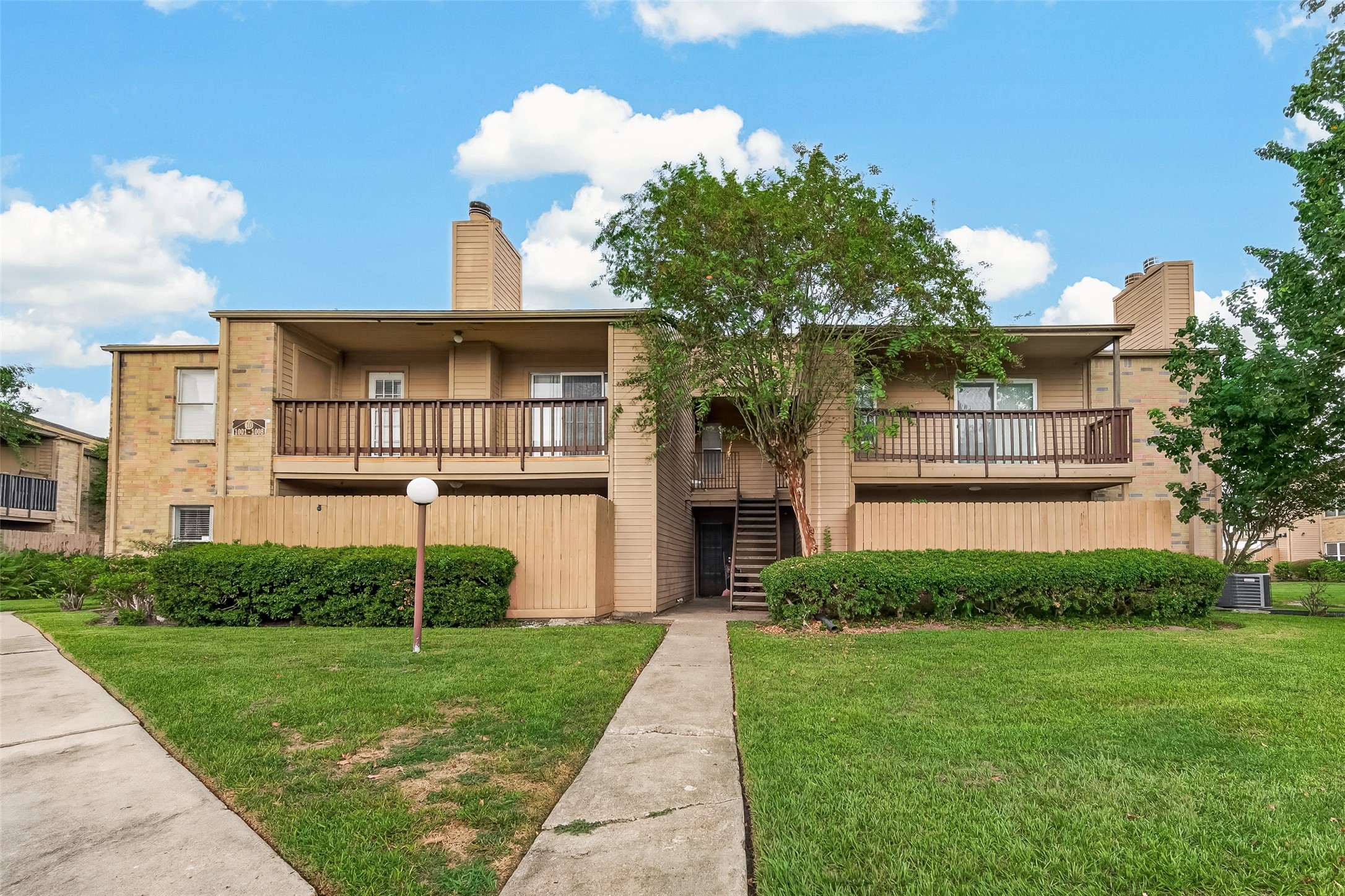 Welcome to your new home! This rare ground-level corner unit awaits you.