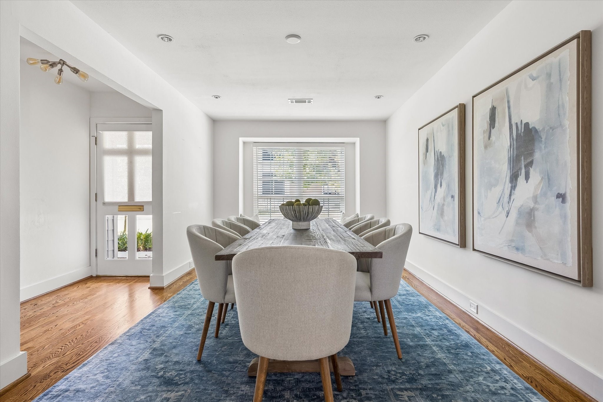 Beautiful hardwood floors and a large front window bring warmth and natural light to this inviting dining room. Beautiful hardwood floors and a large front window bring warmth and natural light to this inviting dining room.