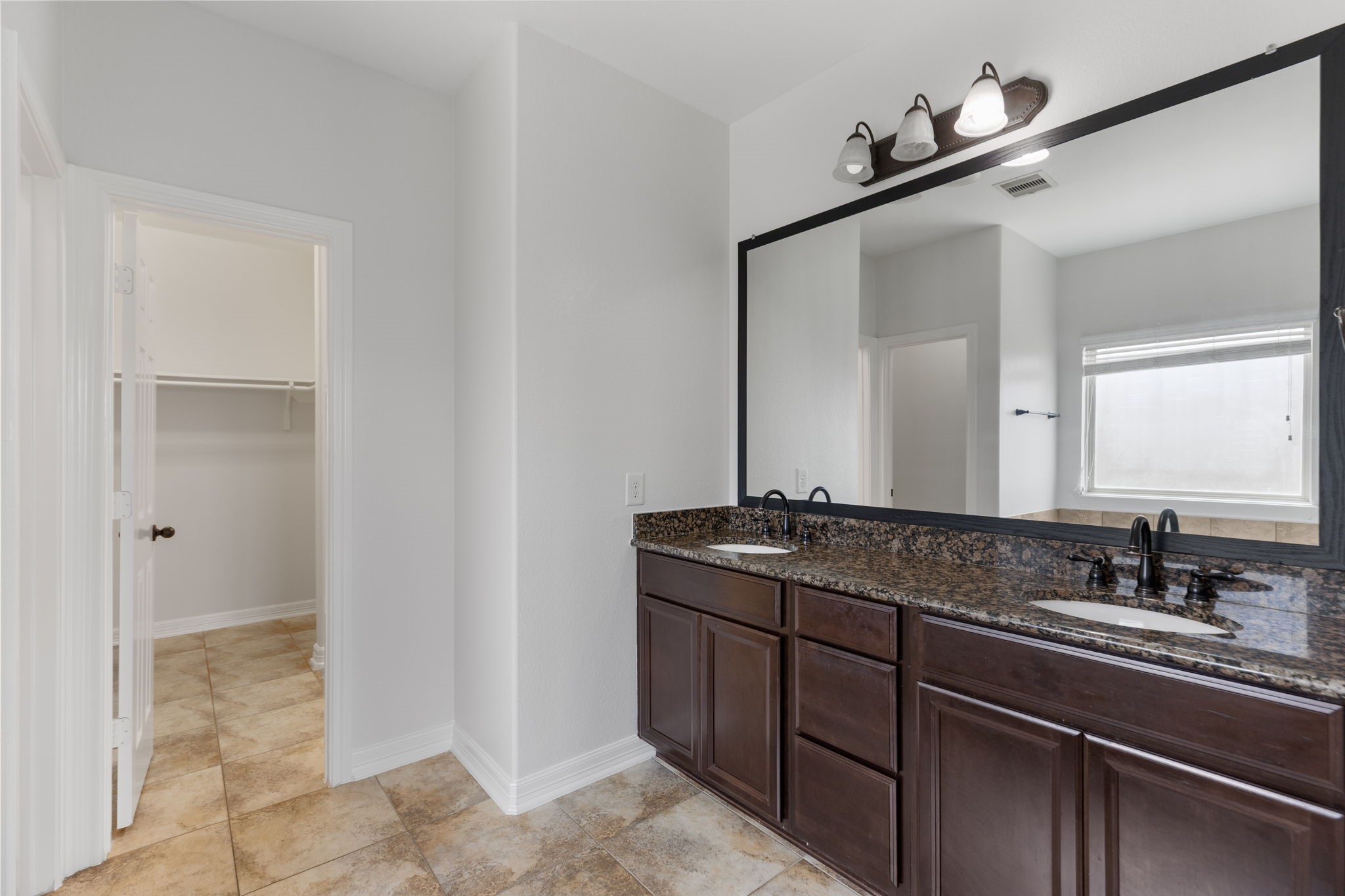 Primary Bathroom with double sinks.