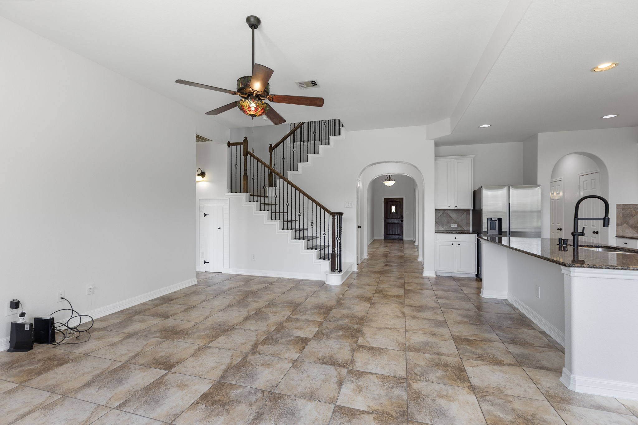 Kitchen looks out onto family room.