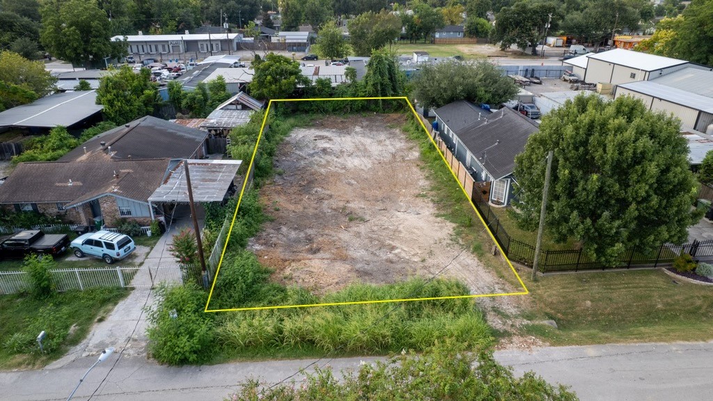 Cleared lot near Independence Heights with approximate property boundaries outlined. Opportunity to develop homes!