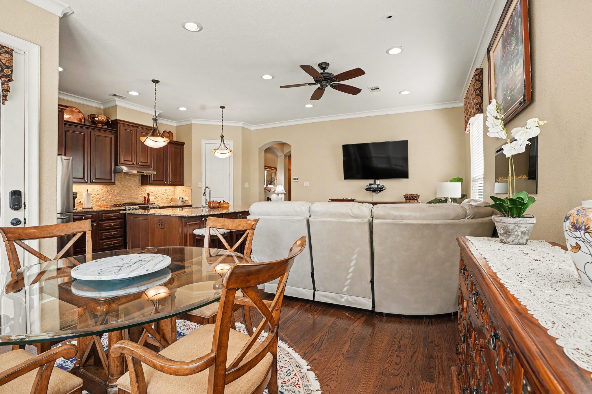 Breakfast table situated near the kitchen and family room