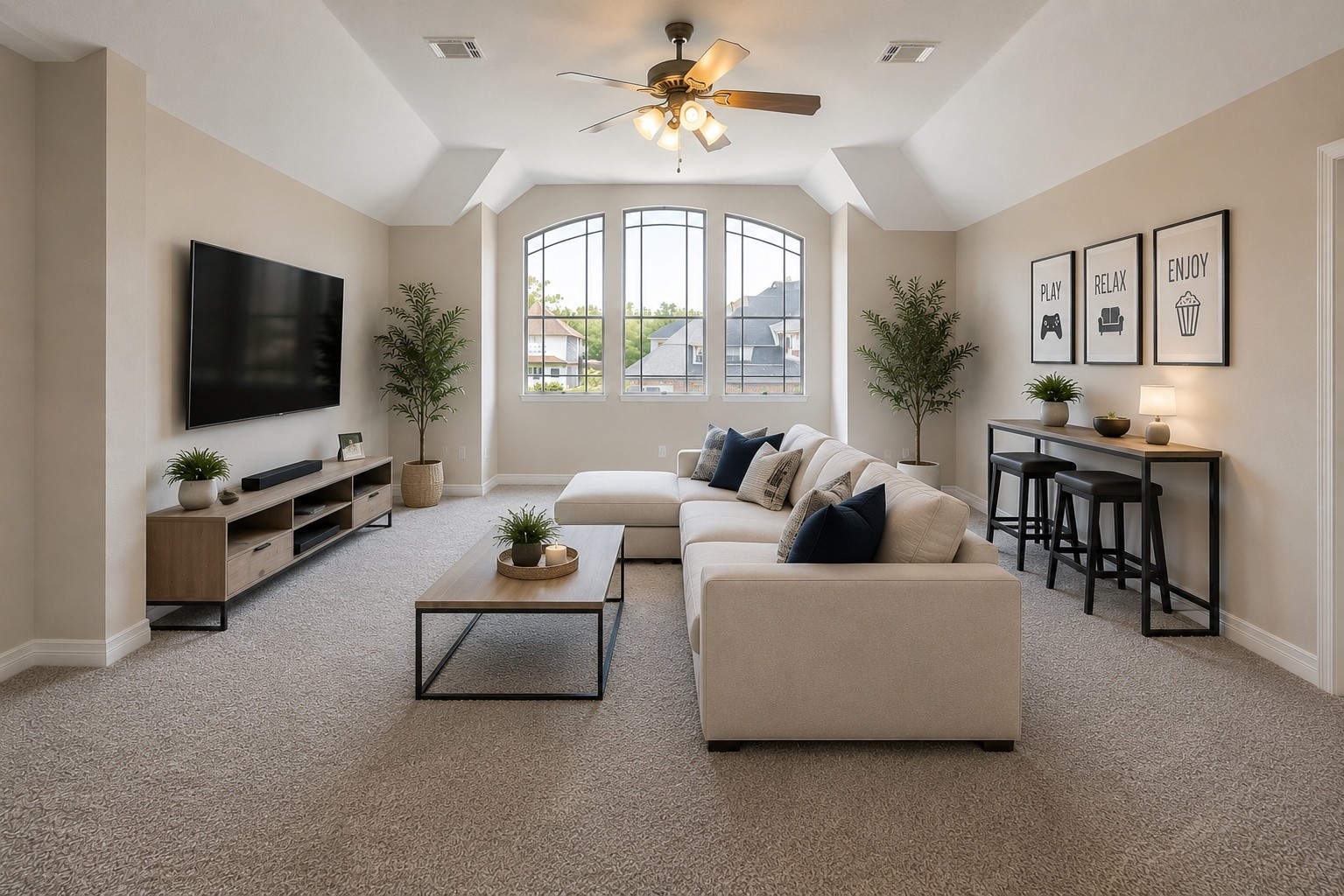 Inviting upstairs game room with a hidden storage closet, offering both style and practicality.
