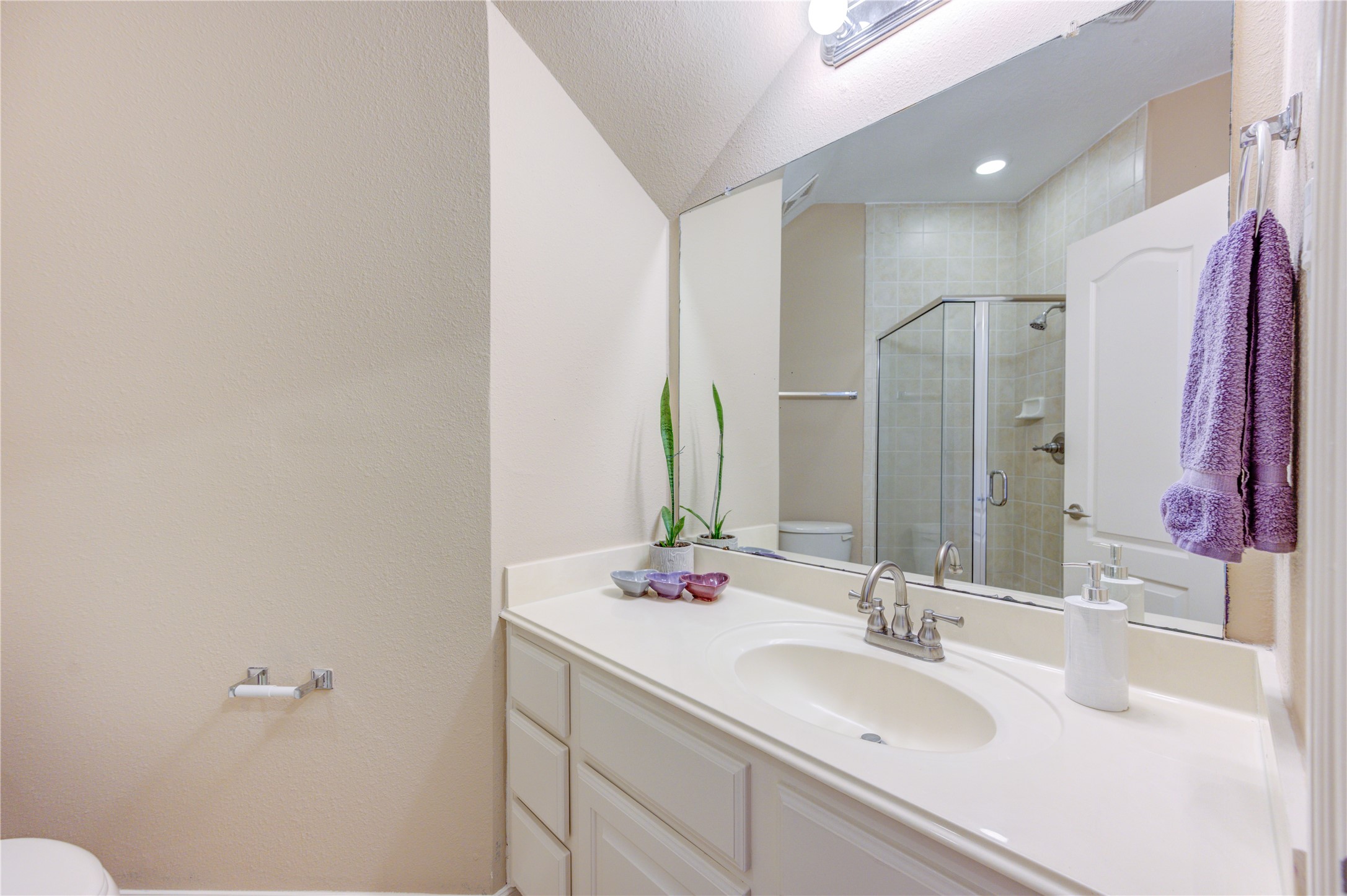 Exceptionally spacious game room offering endless possibilities for entertainment, or secondary living area.
