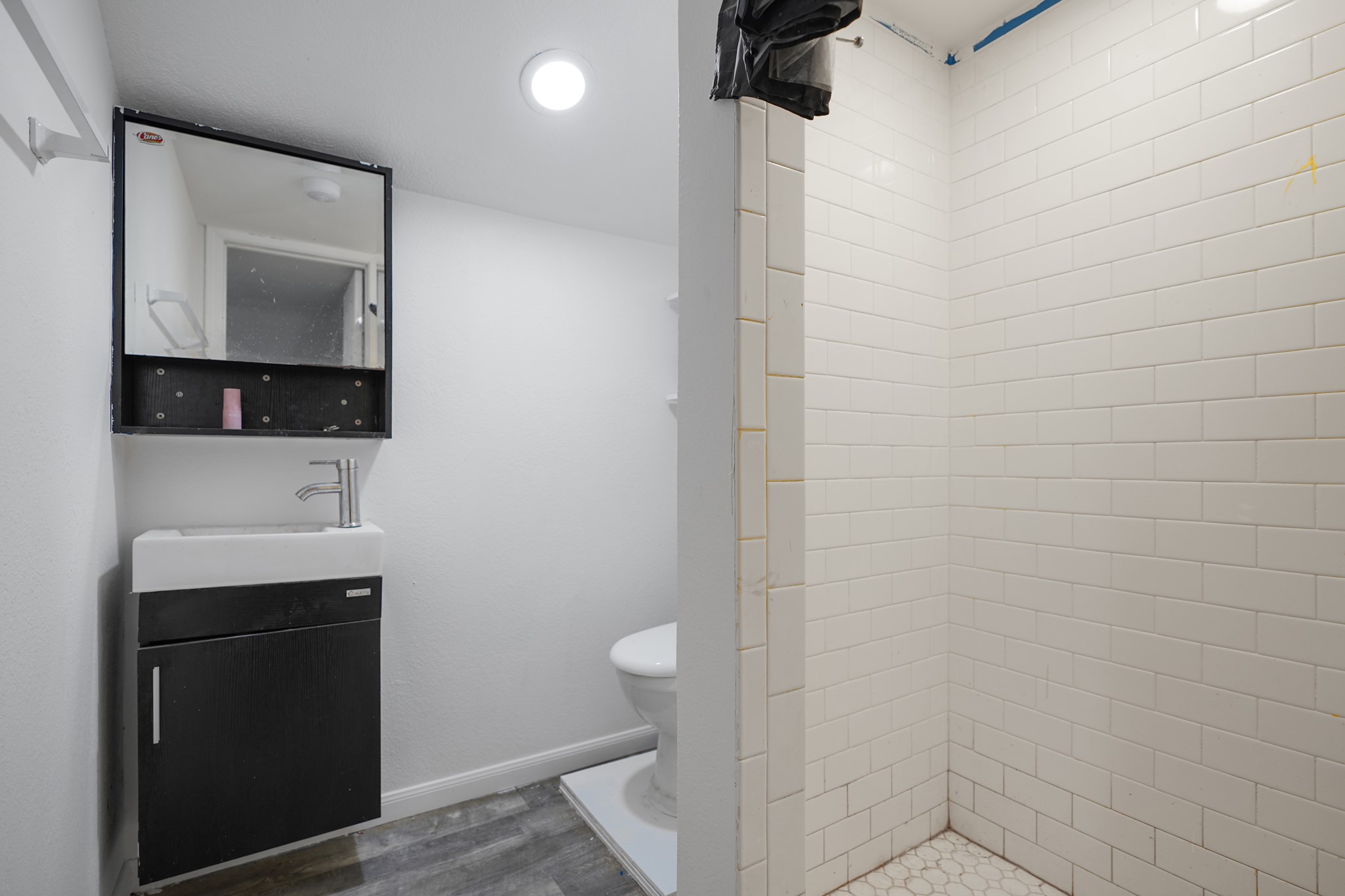 Upstairs apartment 3/4 bath.