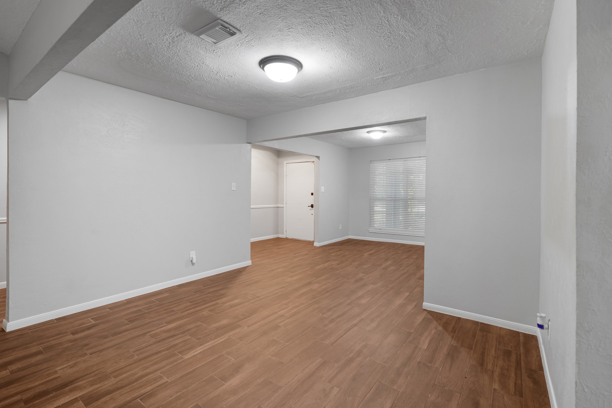 This flexible area can be a formal dining room.