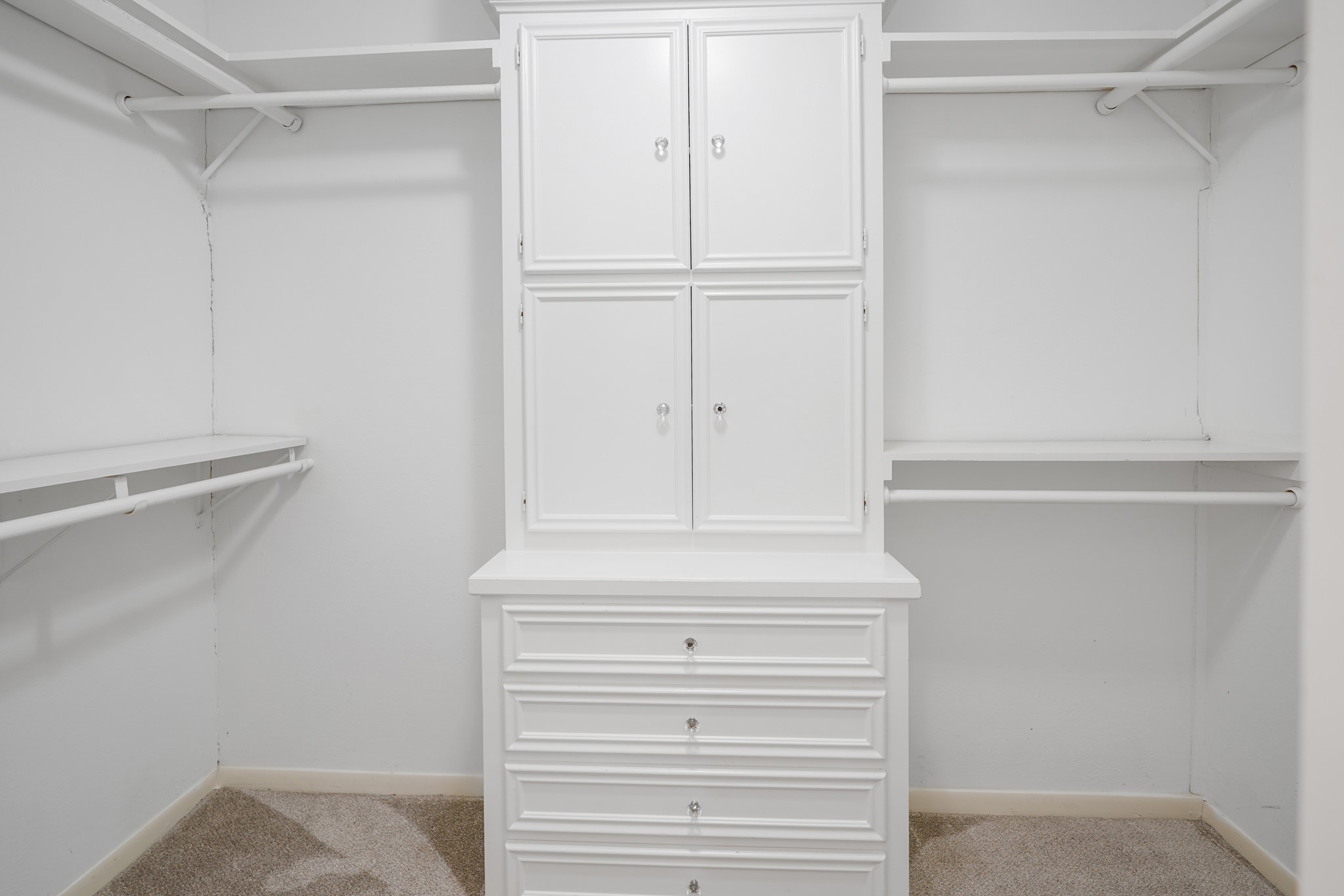 Primary closet with built-ins.