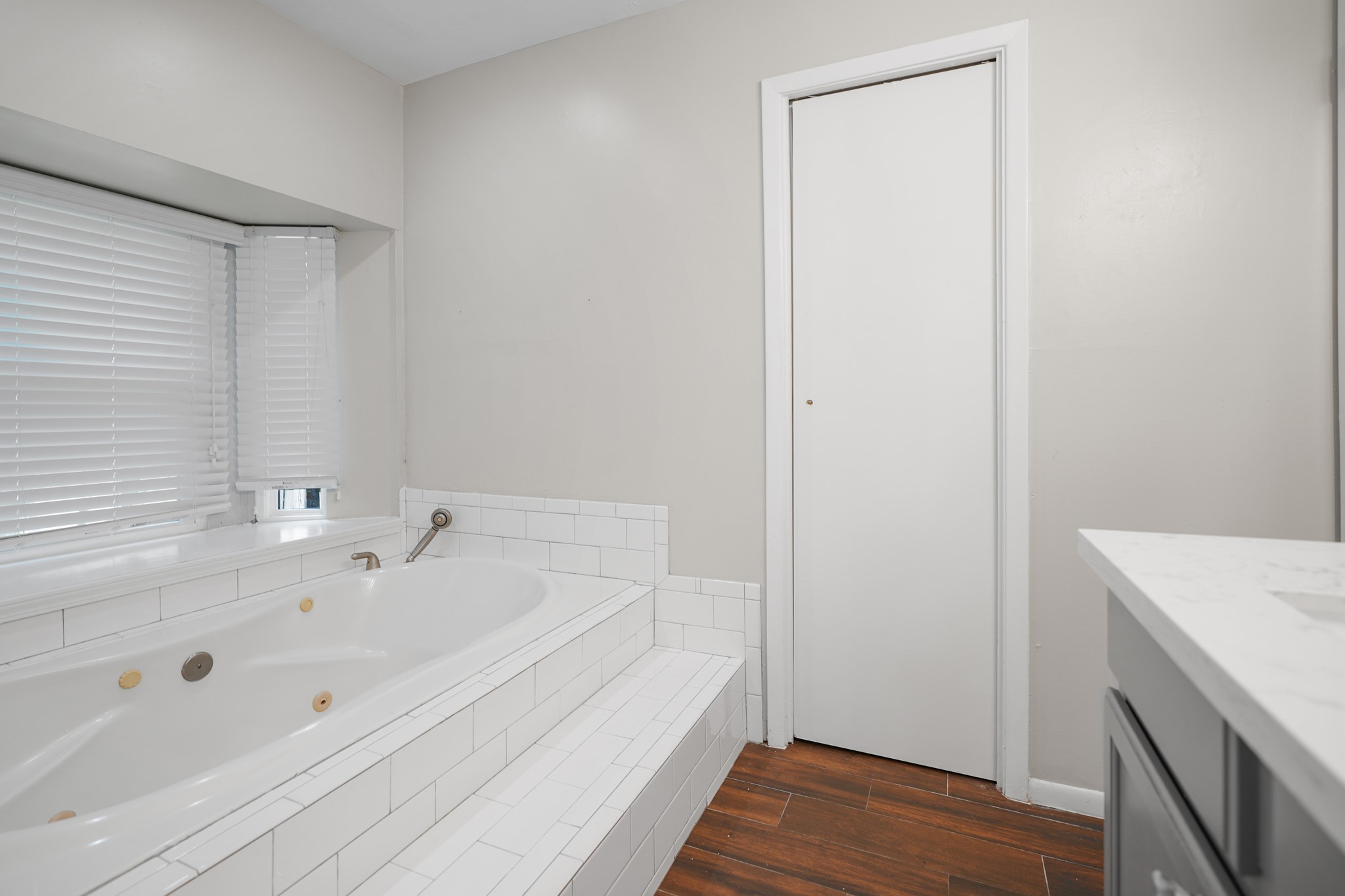 One of the primary bathrooms on the mail level with the jacuzzi tub.