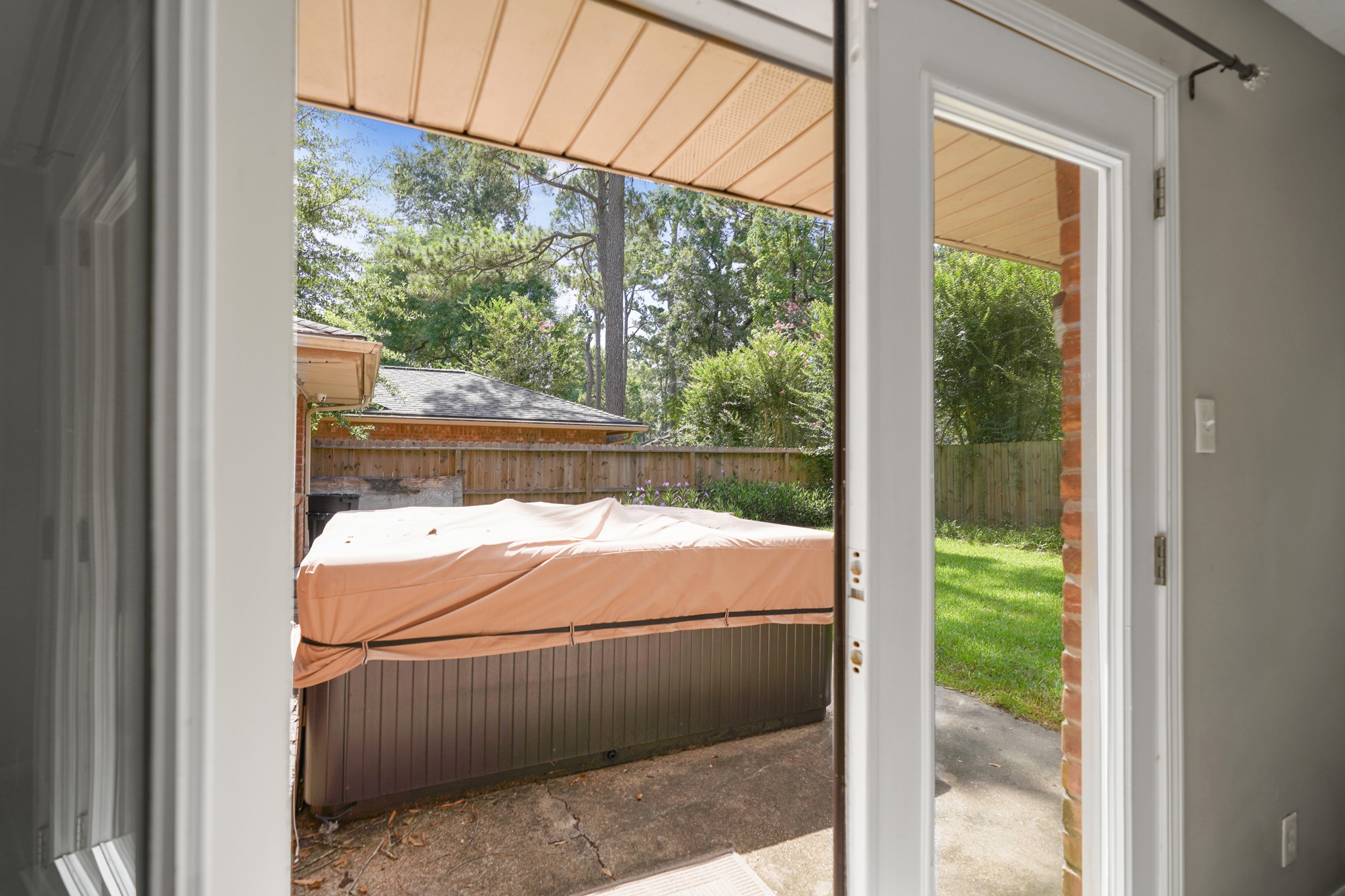 French doors off the primary suite to the backyard.
