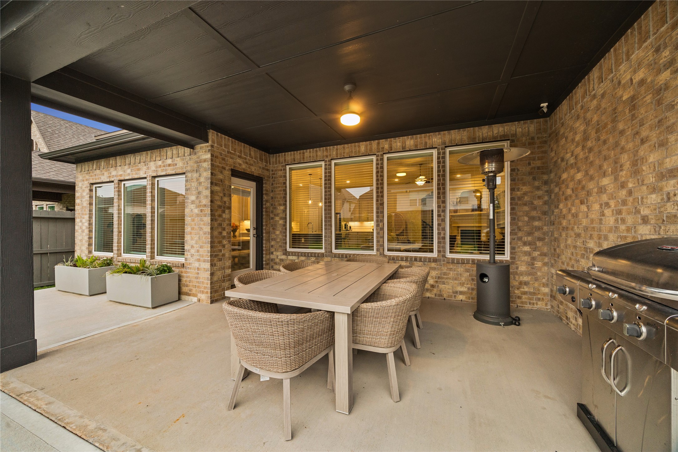 covered back patio with expanded slab.