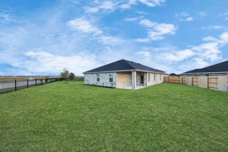 Spacious, fully fenced backyard with room to relax, play, or entertain.