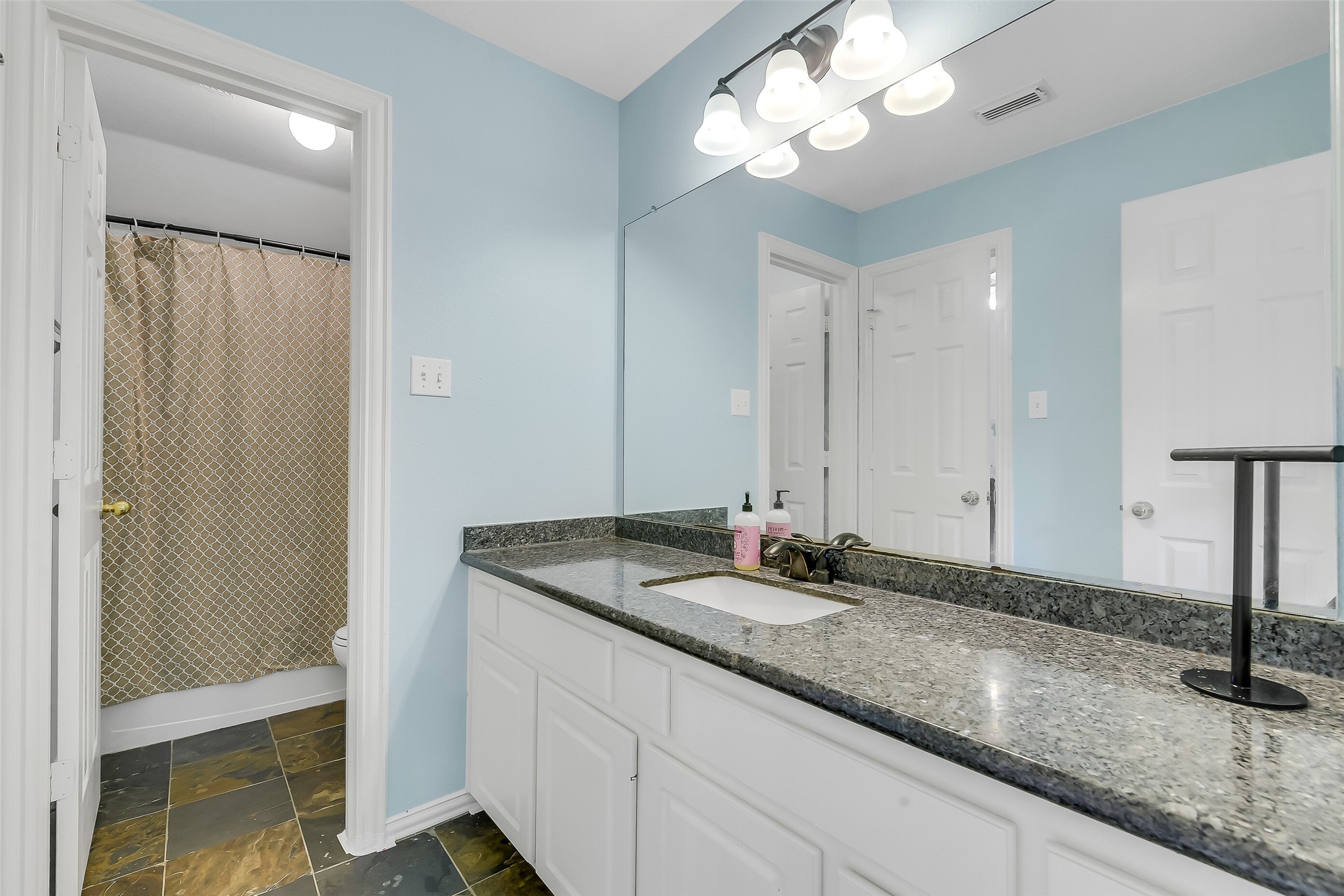 Secondary Jack and Jill Bathroom.