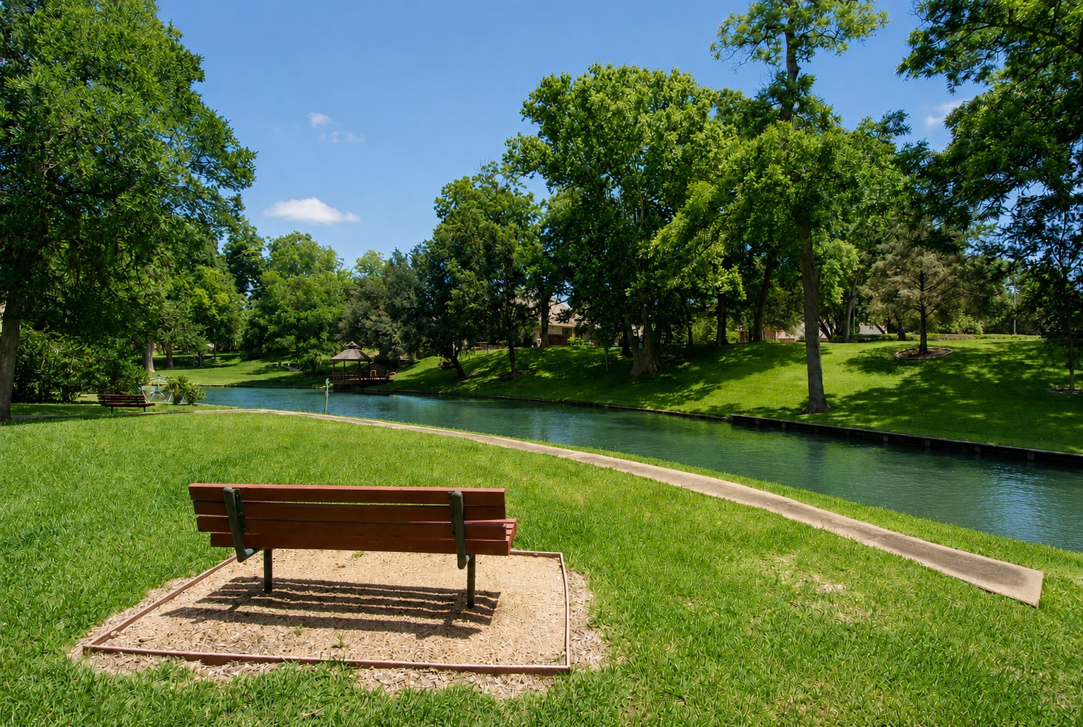 Enjoy peaceful waterfront living at Lake Village Park, where scenic canals, lush green spaces, and majestic oak trees create a tranquil setting just moments from home. Stroll along the walking paths, relax on a shaded bench overlooking the water, or simply take in the beauty of this private neighborhood park. With its picturesque views and serene atmosphere, Lake Village Park offers residents a quiet retreat that perfectly complements the exceptional Weston Lakes lifestyle.