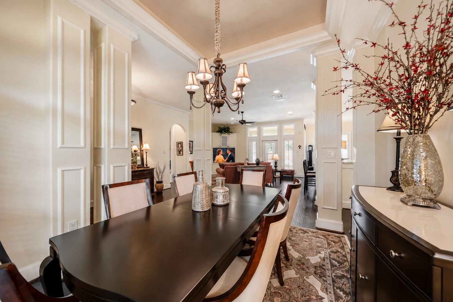 The Dining Room enjoys seamless sightlines into the Family Room and Kitchen, fostering an effortless connection between each gathering space. Whether hosting holiday celebrations or intimate dinners, conversation and laughter can flow freely throughout the home's thoughtfully designed open layout. The Dining Room enjoys seamless sightlines into the Family Room and Kitchen, fostering an effortless connection between each gathering space. Whether hosting holiday celebrations or intimate dinners, conversation and laughter can flow freely throughout the home's thoughtfully designed open layout.
