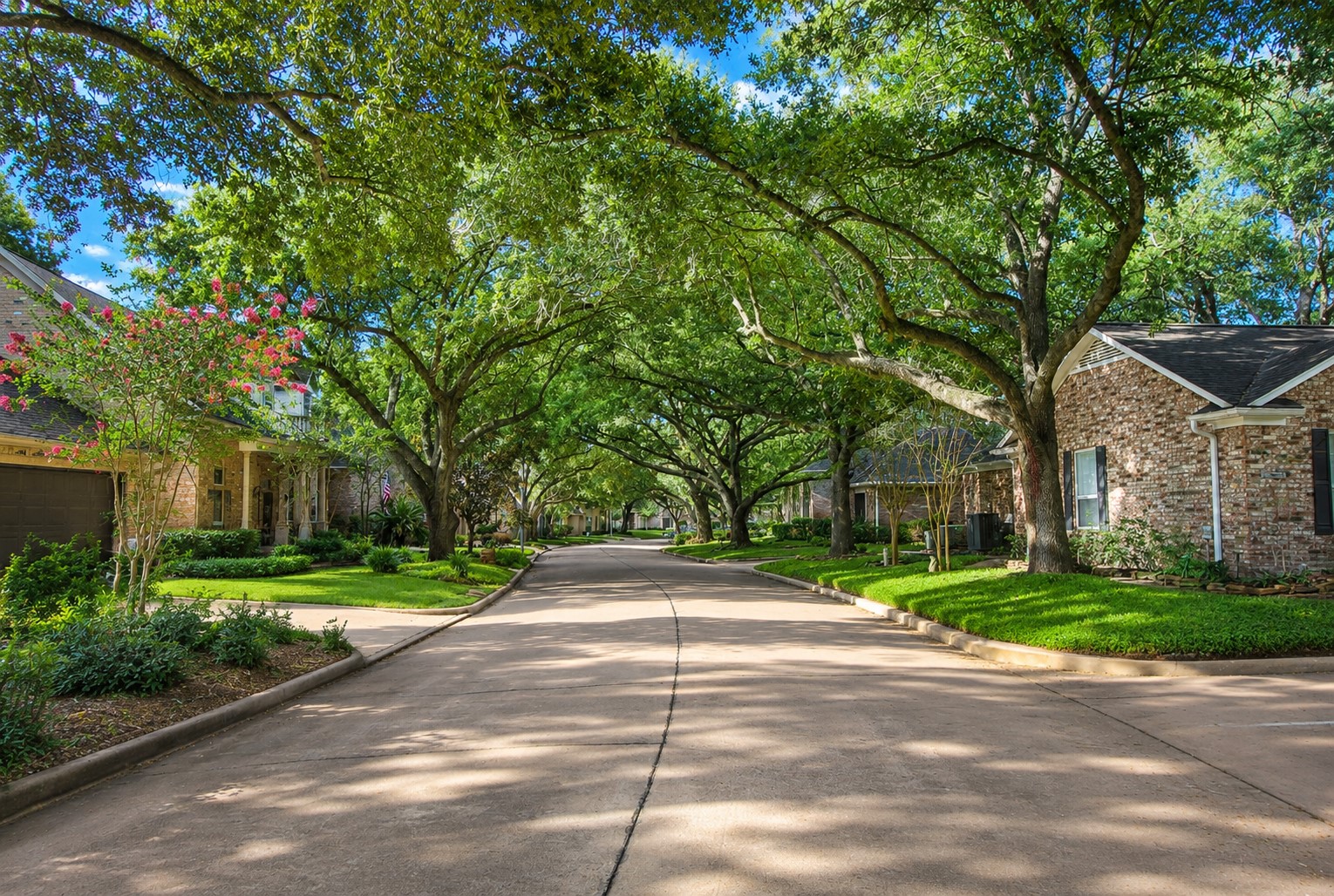 Nestled beneath a magnificent canopy of mature oak trees, this picturesque neighborhood offers a setting that is as peaceful as it is beautiful. Winding streets, impeccably maintained landscaping, and scenic waterways create a timeless atmosphere, while the nearby Lake Village Park invites residents to enjoy leisurely strolls, quiet afternoons by the water, or simply relax beneath the shade of towering trees.
