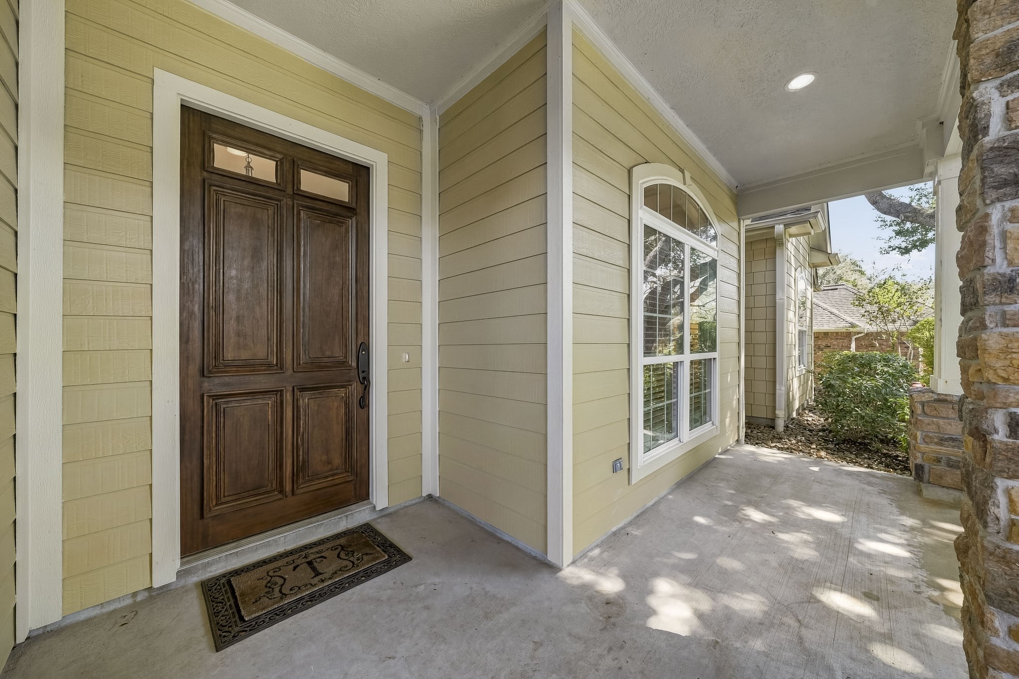 The spacious covered Front Porch offers a warm welcome and the perfect place to unwind. Picture yourself settling into a rocking chair with a glass of sweet tea in hand, enjoying the gentle breeze as the day slowly drifts by. The spacious covered Front Porch offers a warm welcome and the perfect place to unwind. Picture yourself settling into a rocking chair with a glass of sweet tea in hand, enjoying the gentle breeze as the day slowly drifts by.