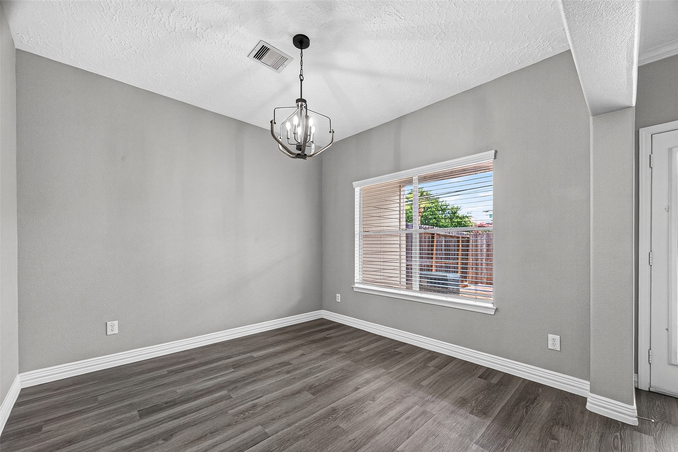Dining space with large window for natural light